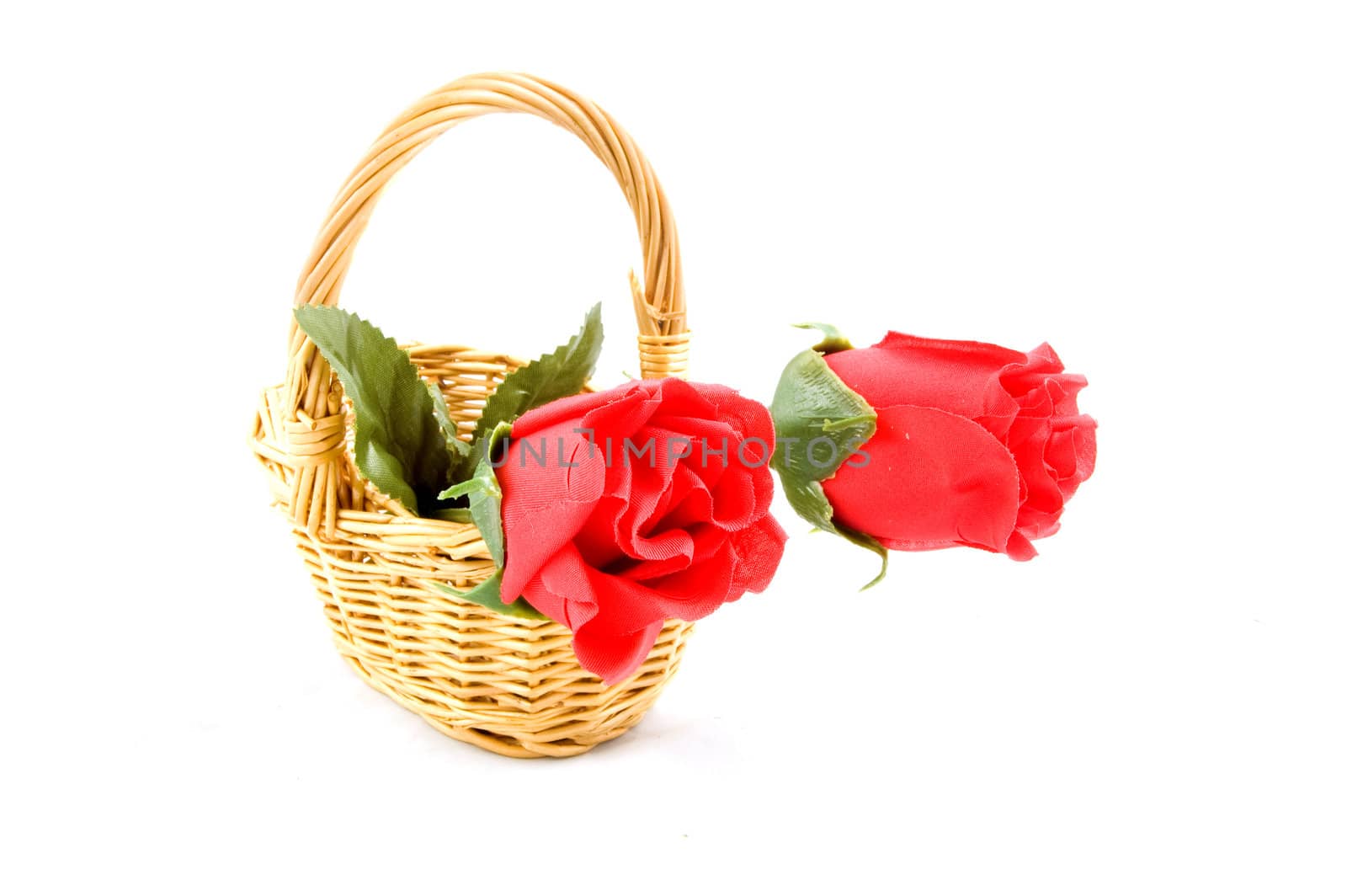 Isolated basket of red roses by ladyminnie
