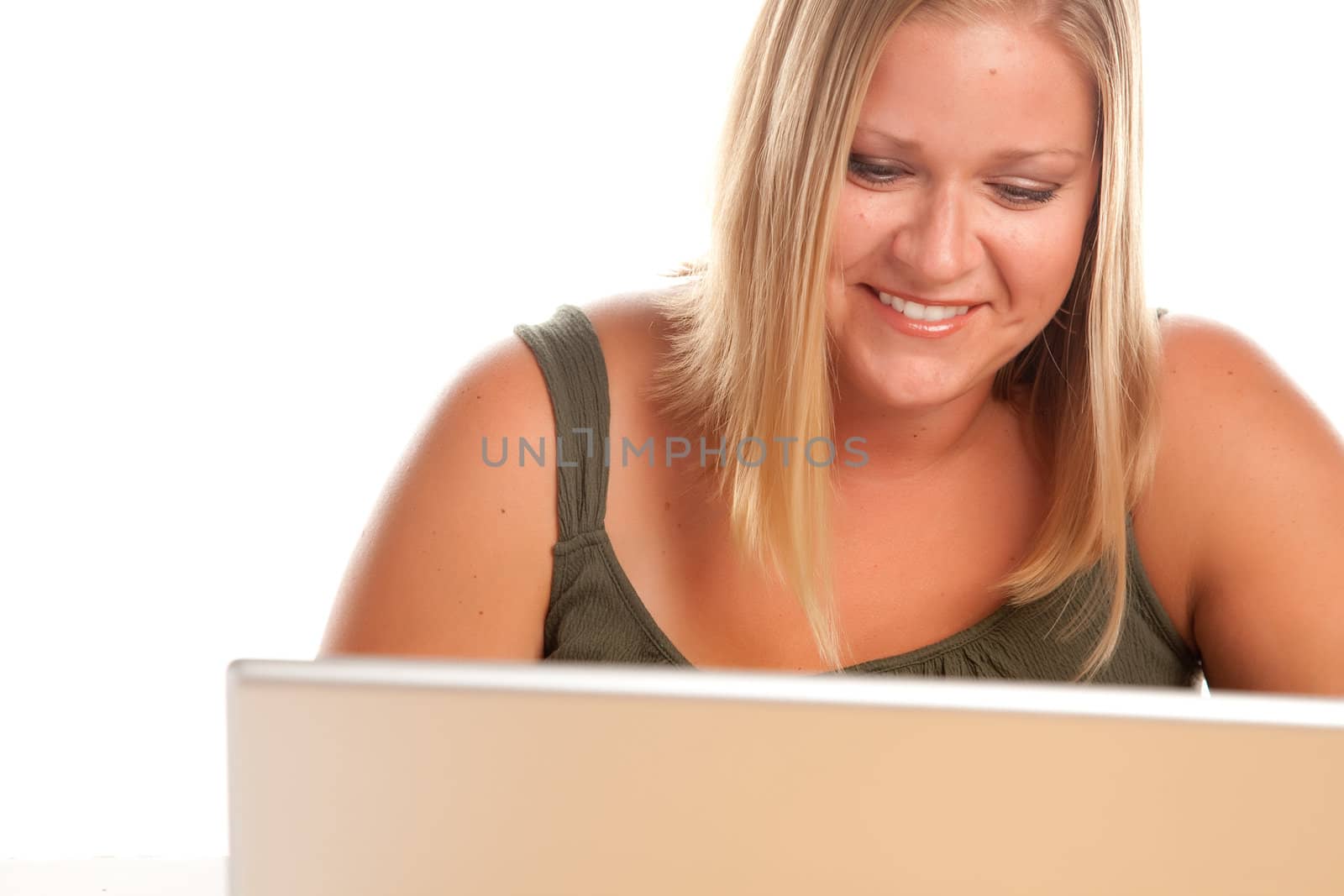 Smiling Beautiful Blonde Woman Using A Laptop.
