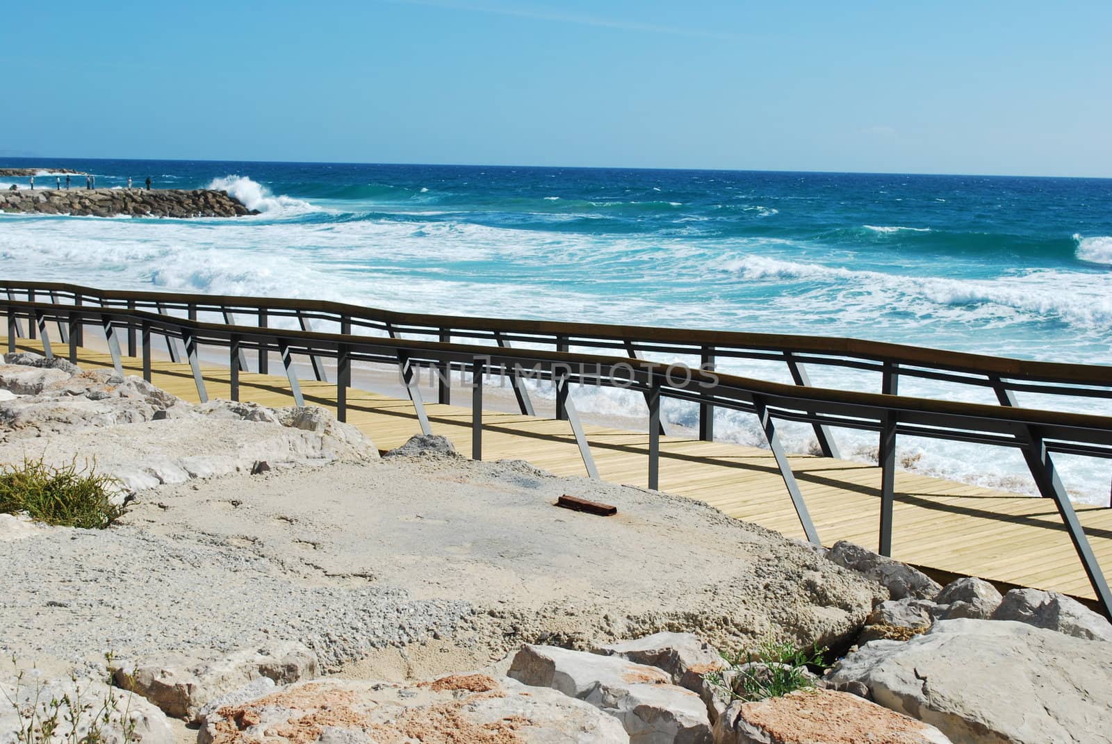 entering the beach through a boardwalk (ocean scene)