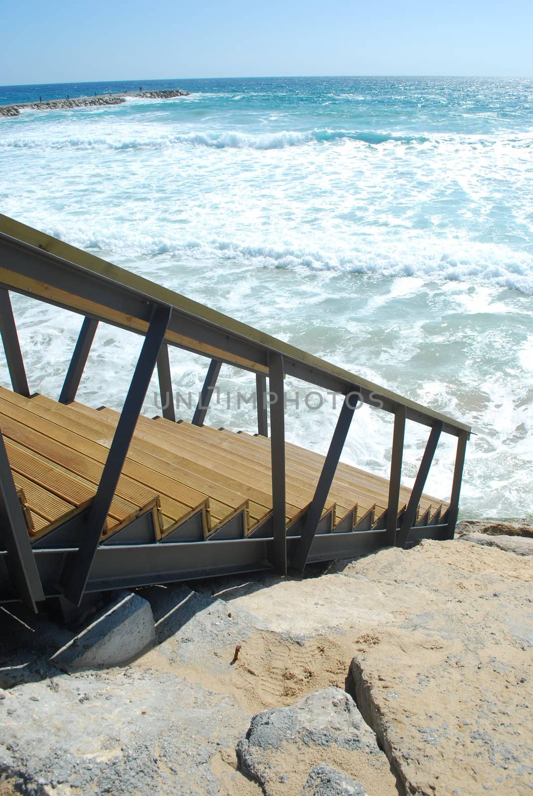 Wooden stairs or path to the bright ocean by luissantos84