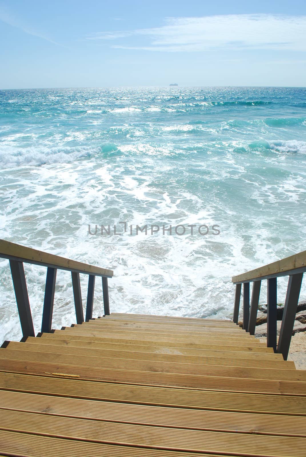 Wooden stairs or path to the bright ocean by luissantos84