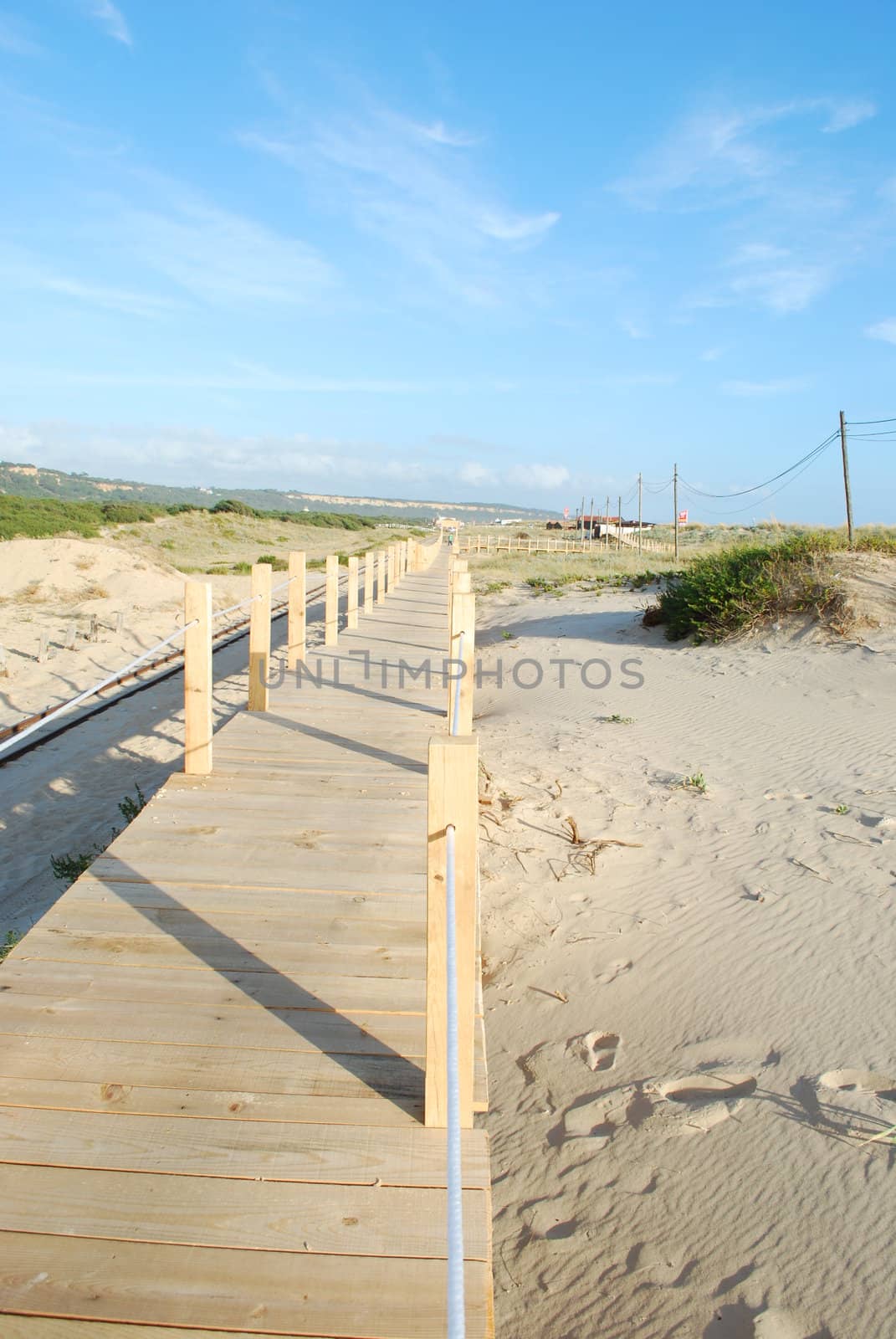 Boardwalk entering the beach by luissantos84