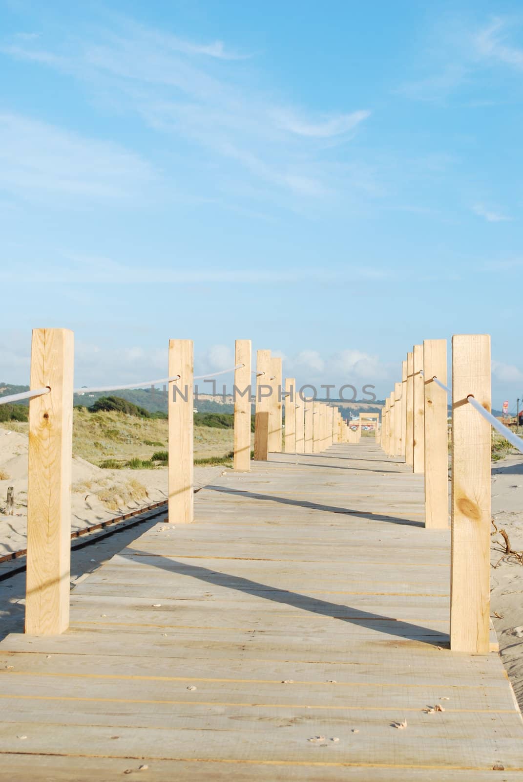 Boardwalk entering the beach by luissantos84