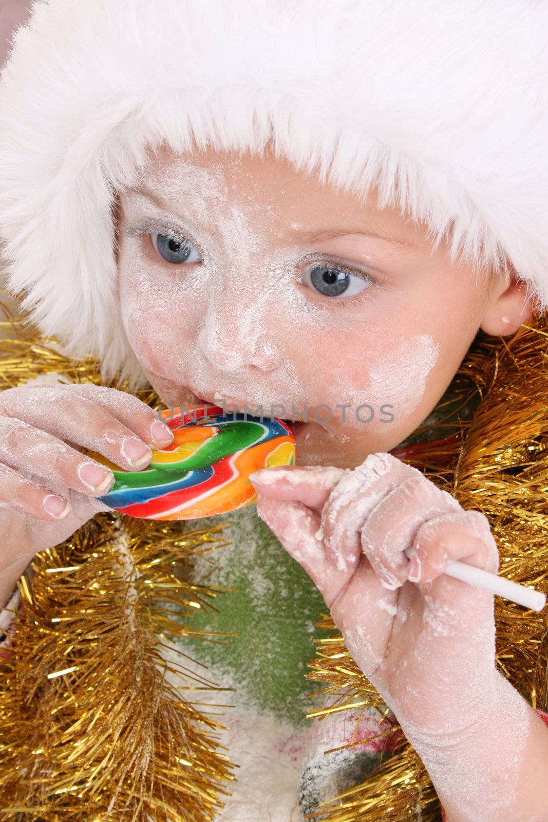 Christmas toddler got a lollipop reward for baking cookies