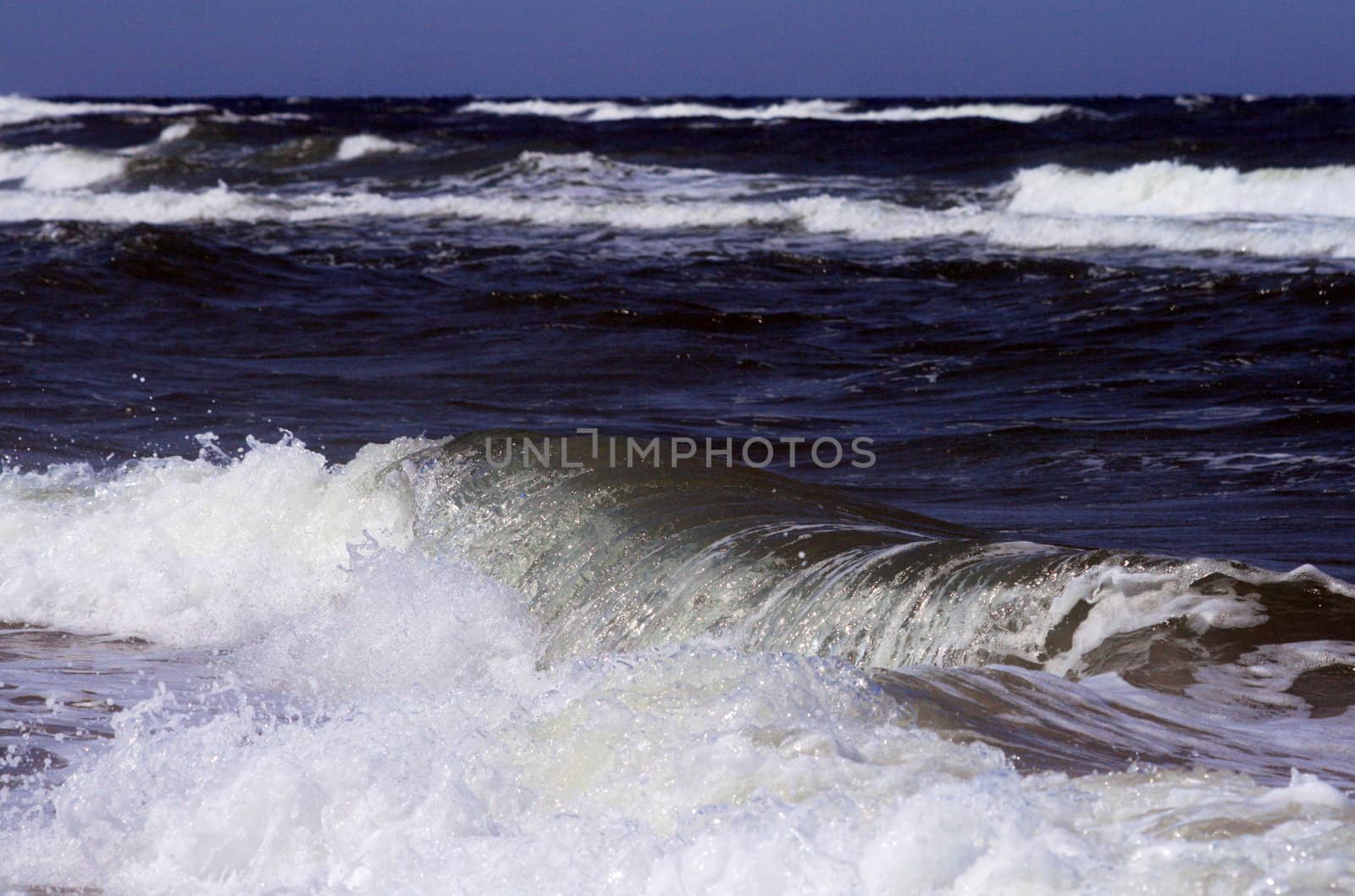 Waves splashing just before the beach