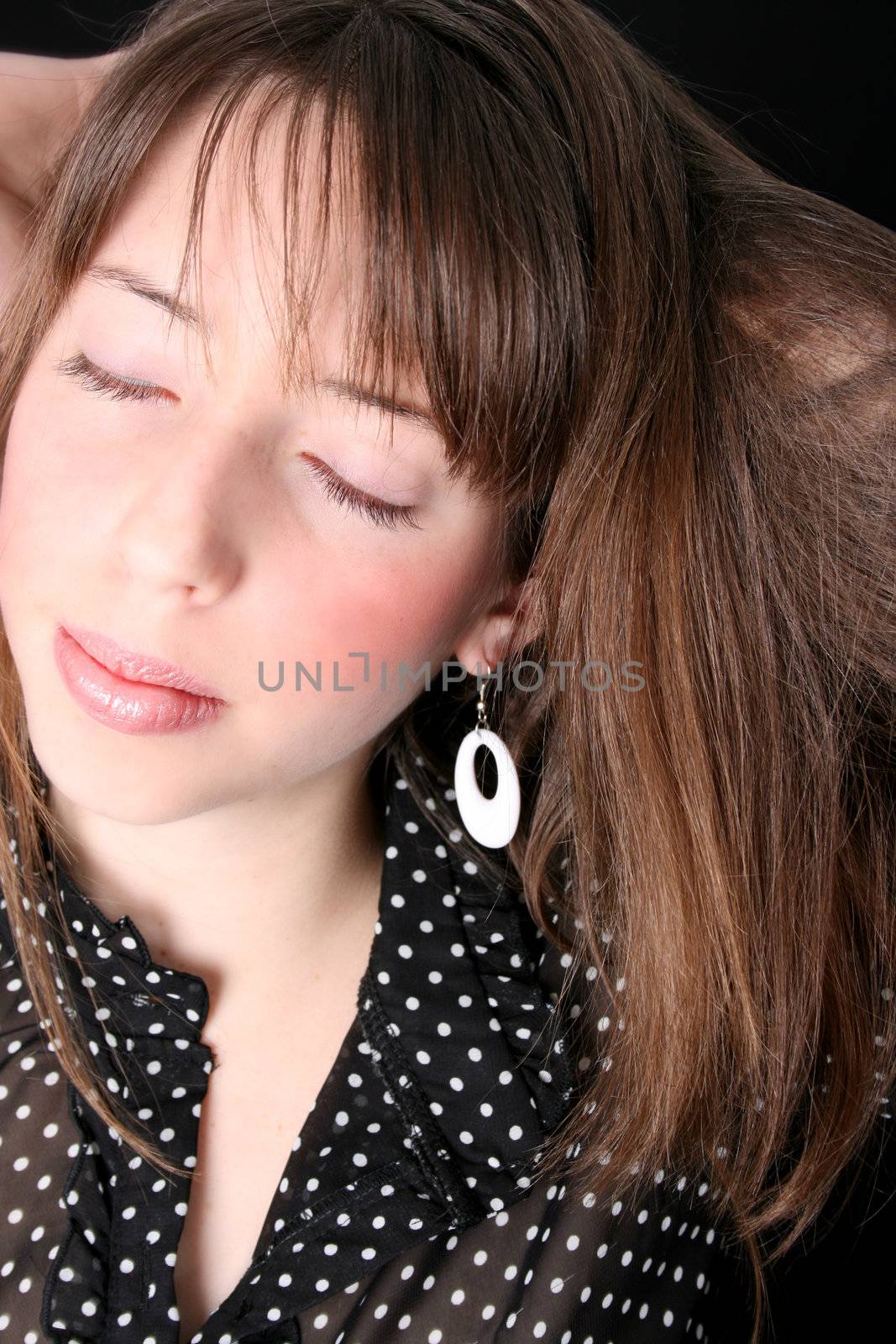 Close up of a teen model with closed eyes