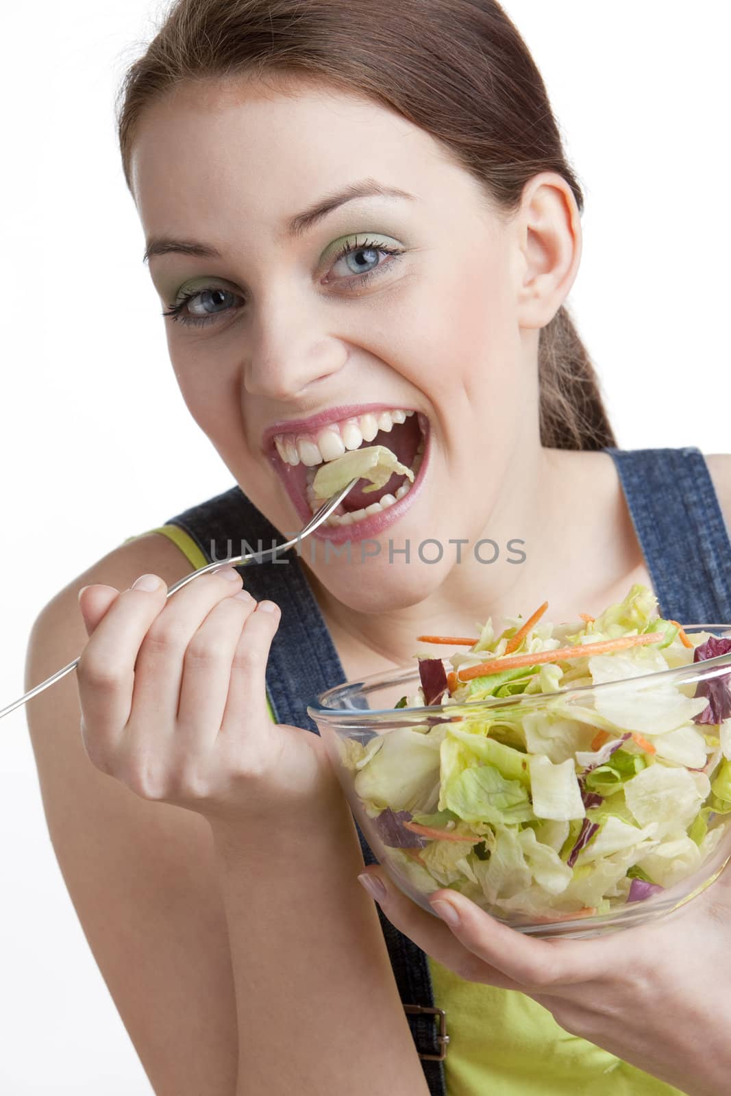 portrait of woman eating salad