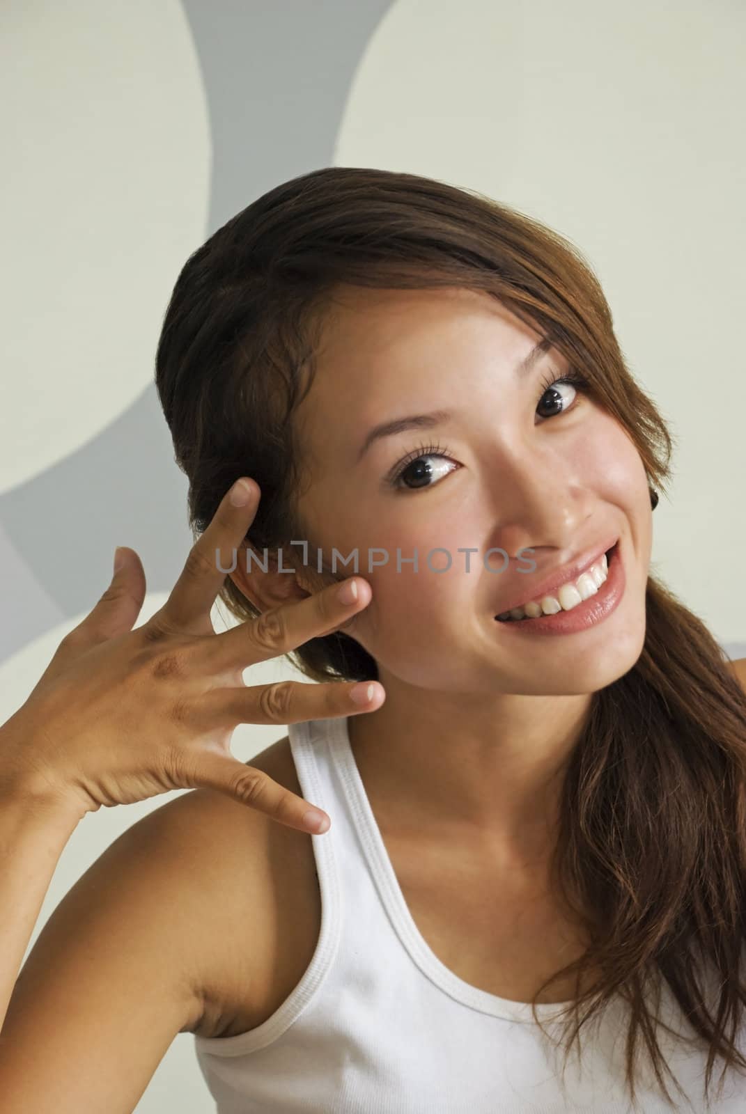 Beautiful Asian Lady Smiling by ilgitano