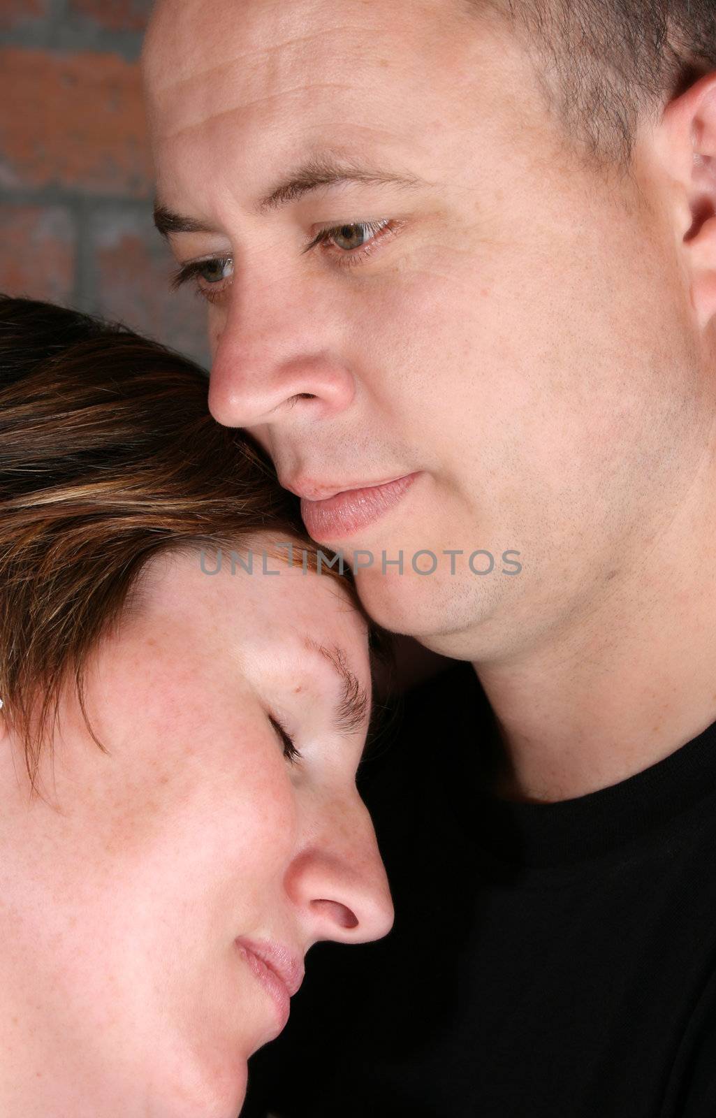 Young couple in love, faces close to one another