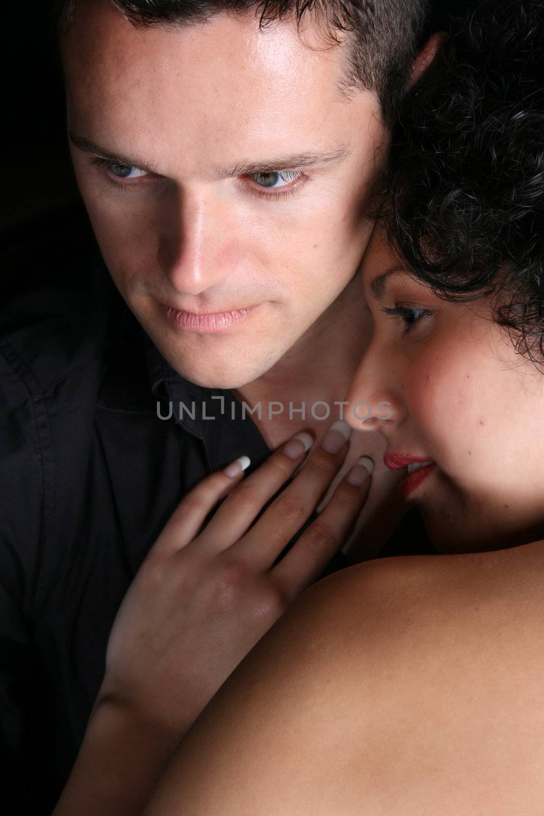 Young couple in love, faces close to one another