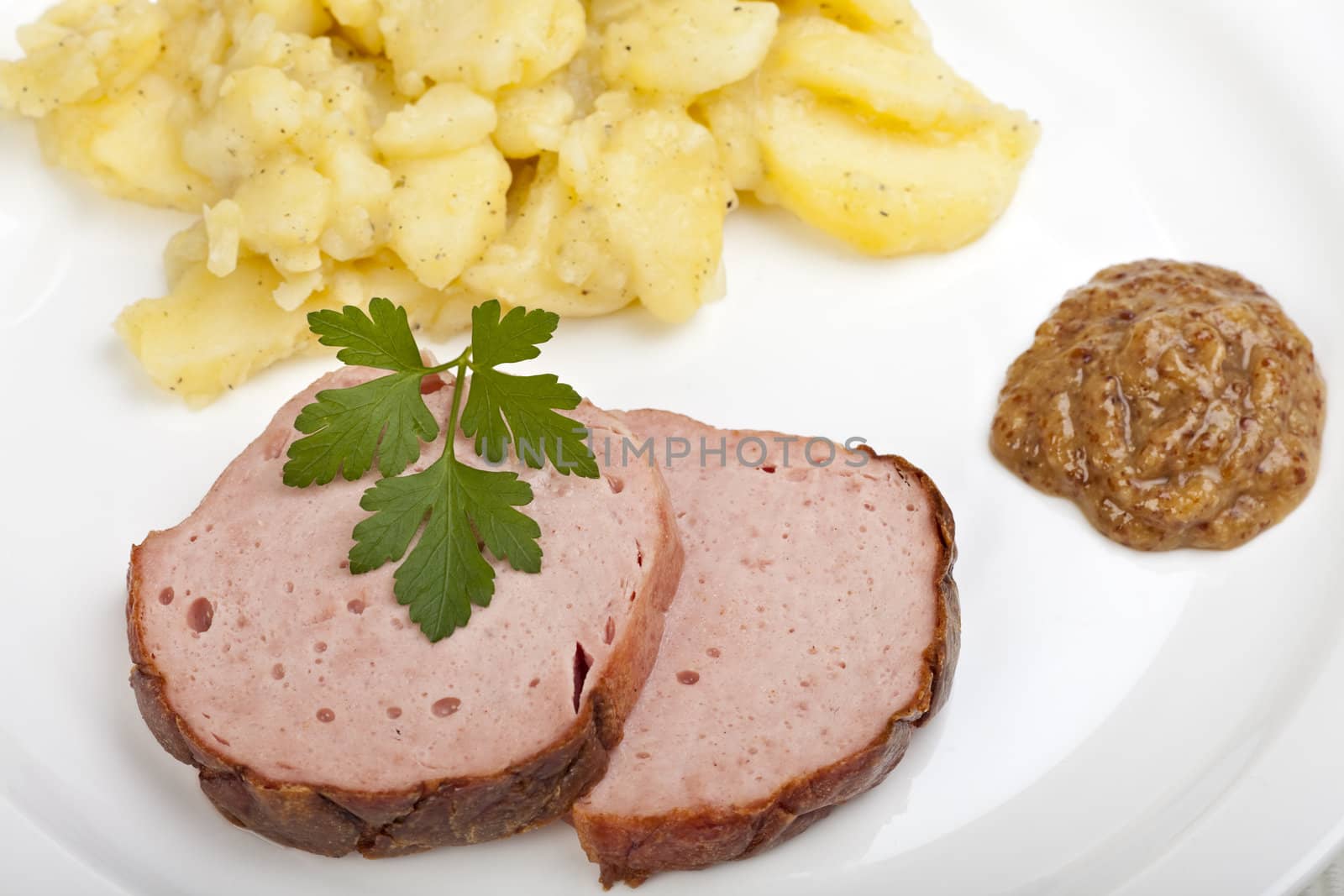 baked bavarian meat loaf on a wooden desk