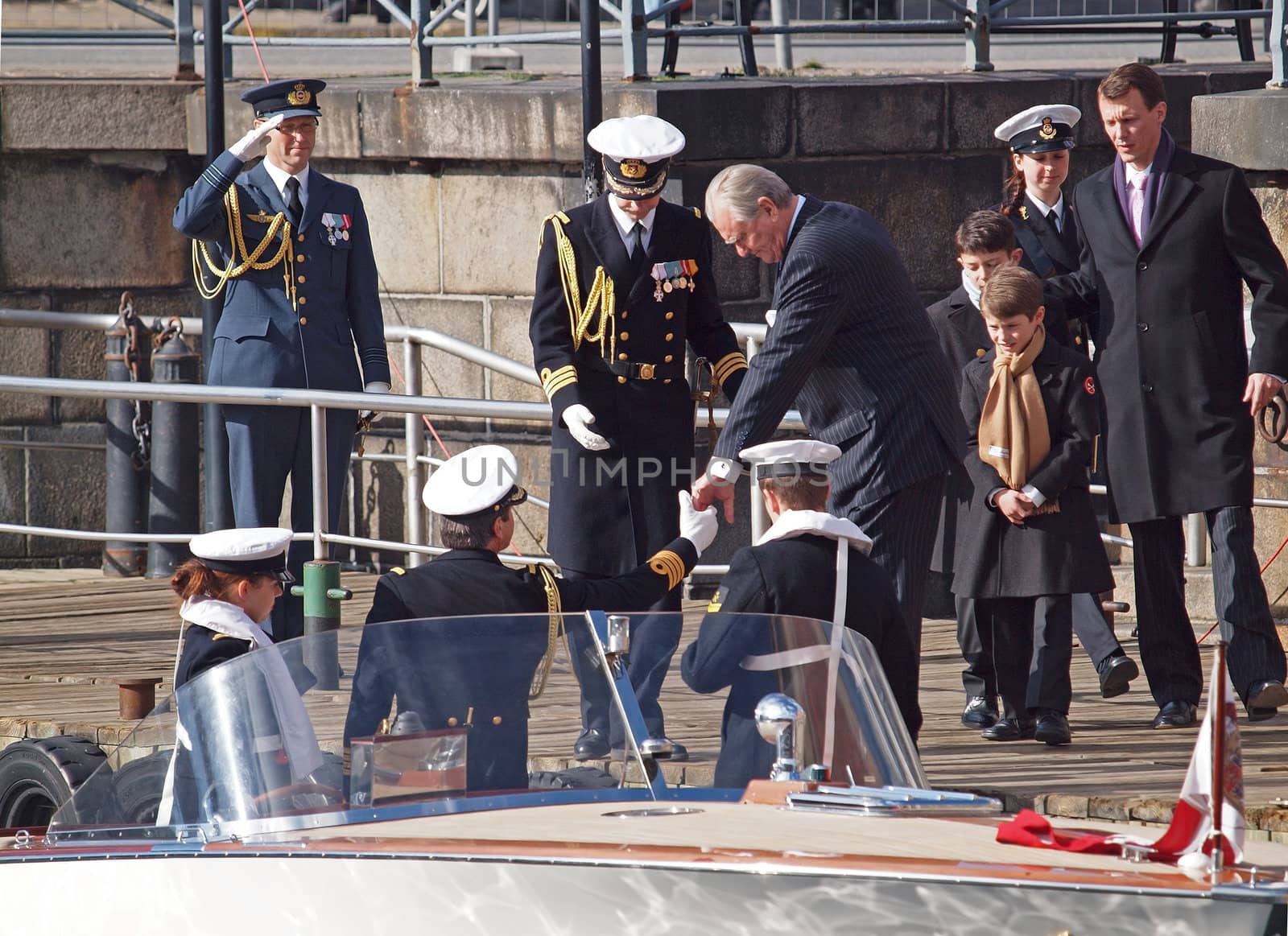 COPENHAGEN - APR 14: Henrik, Prince Consort of Denmark and Prince Joachim after the christening of Prince Vincent and Princess Josephine on April 14, 2011 at Holmens Kirke Copenhagen, Denmark.