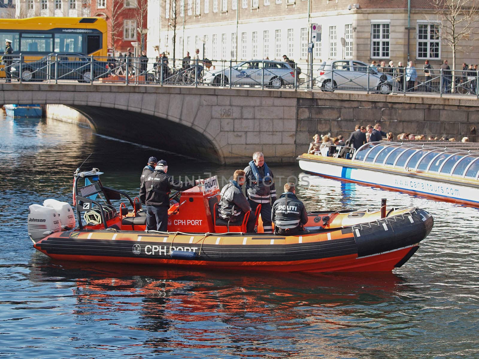 COPENHAGEN - APR 14: Unknown Danish Policemen escort European Royal guests to the reception after the christening of Prince Vincent and Princess Josephine on April 14, 2011, Copenhagen, Denmark.