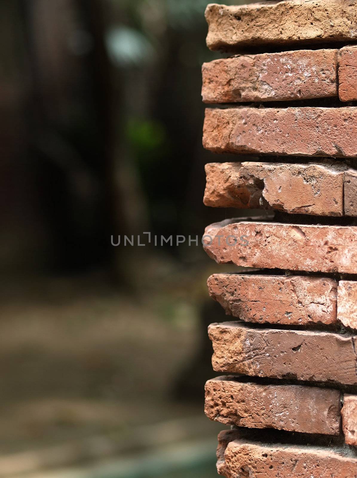 background of flat piled brick wall edge