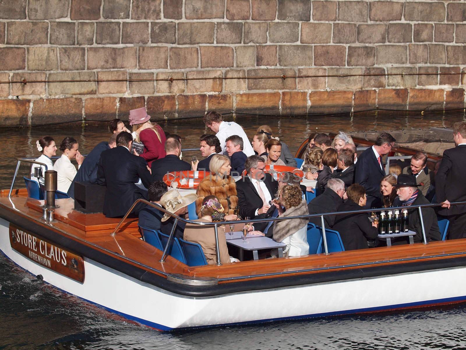 COPENHAGEN - APR 14: Unknown European Royal guests and friends on boat, on the way to reception after the christening of Prince Vincent and Princess Josephine on April 14, 2011 in Copenhagen, Denmark.

