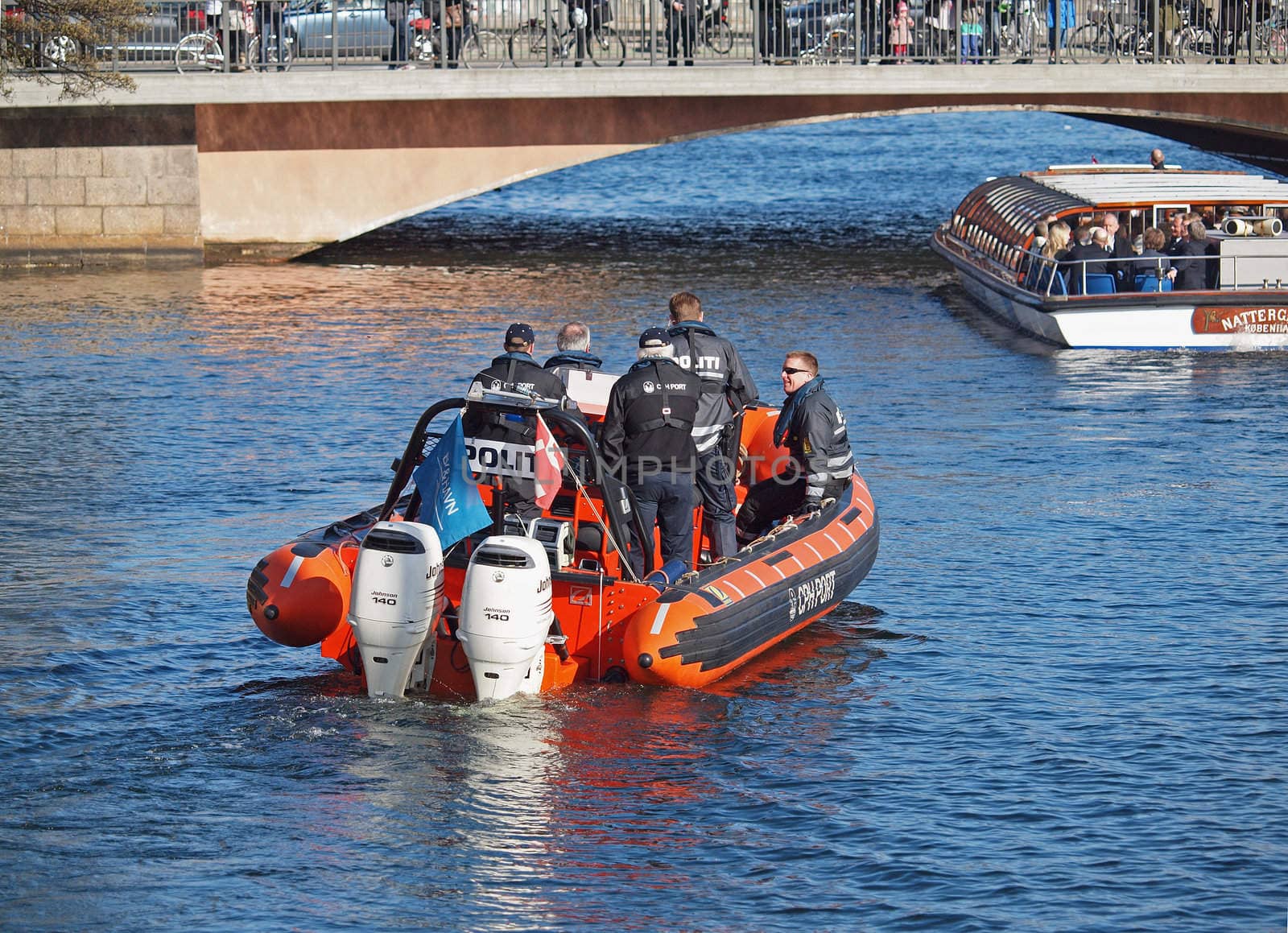 COPENHAGEN - APR 14: Unknown Danish Policemen escort European Royal guests to the reception after the christening of Prince Vincent and Princess Josephine on April 14, 2011, Copenhagen, Denmark.