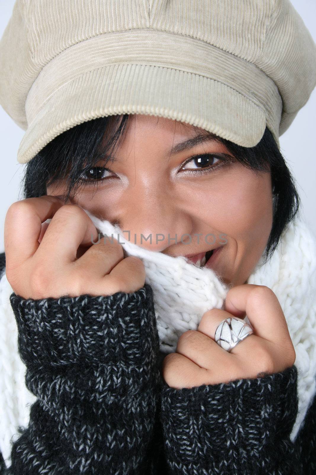 Beautiful young woman dressed in winter clothing