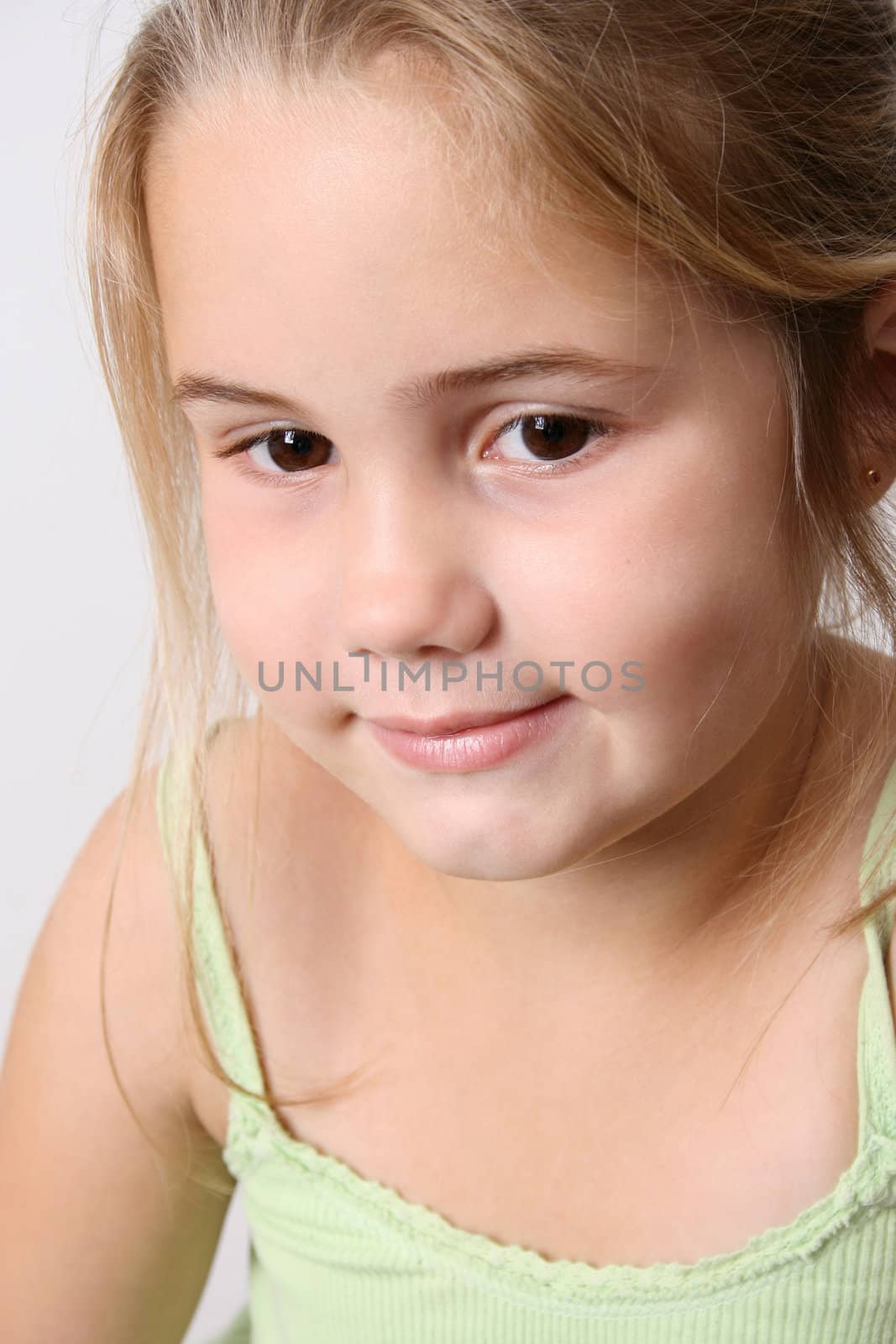 Beautiful young girl with deep brown eyes
