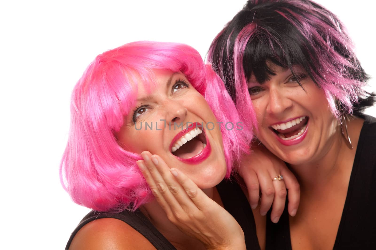 Portrait of Two Pink And Black Haired Smiling Girls Isolated on a White Background.