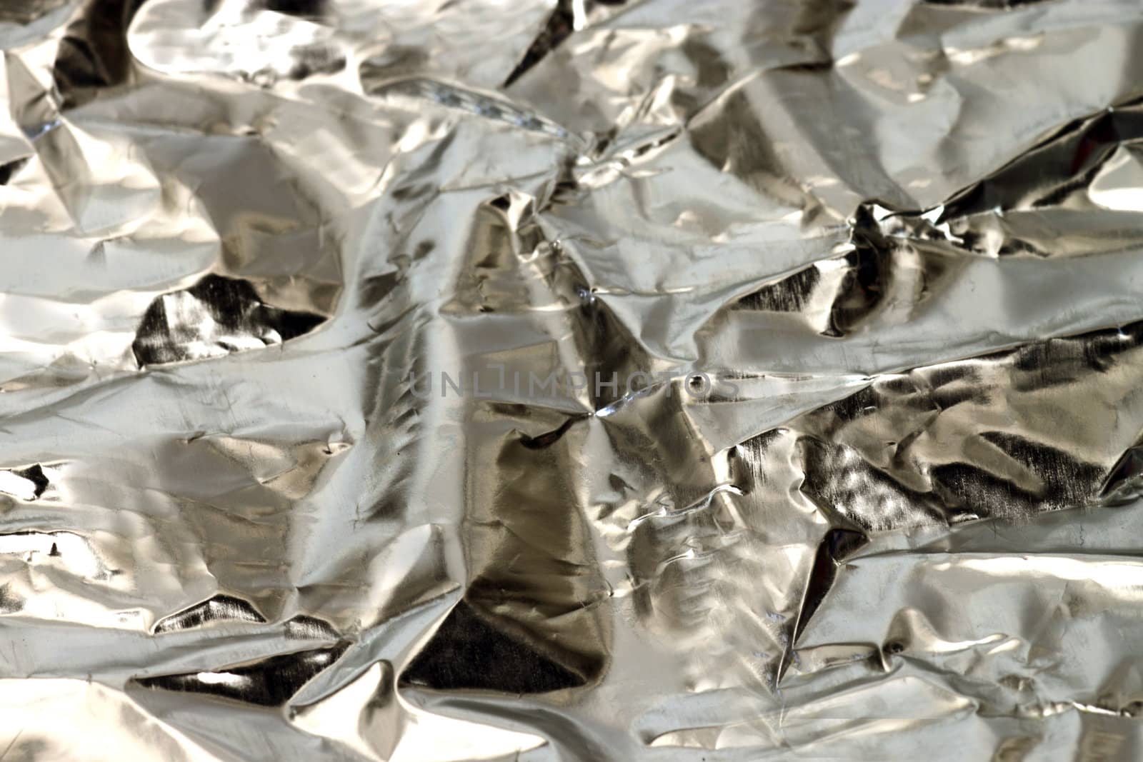 Texture of crumbled aluminum foil
