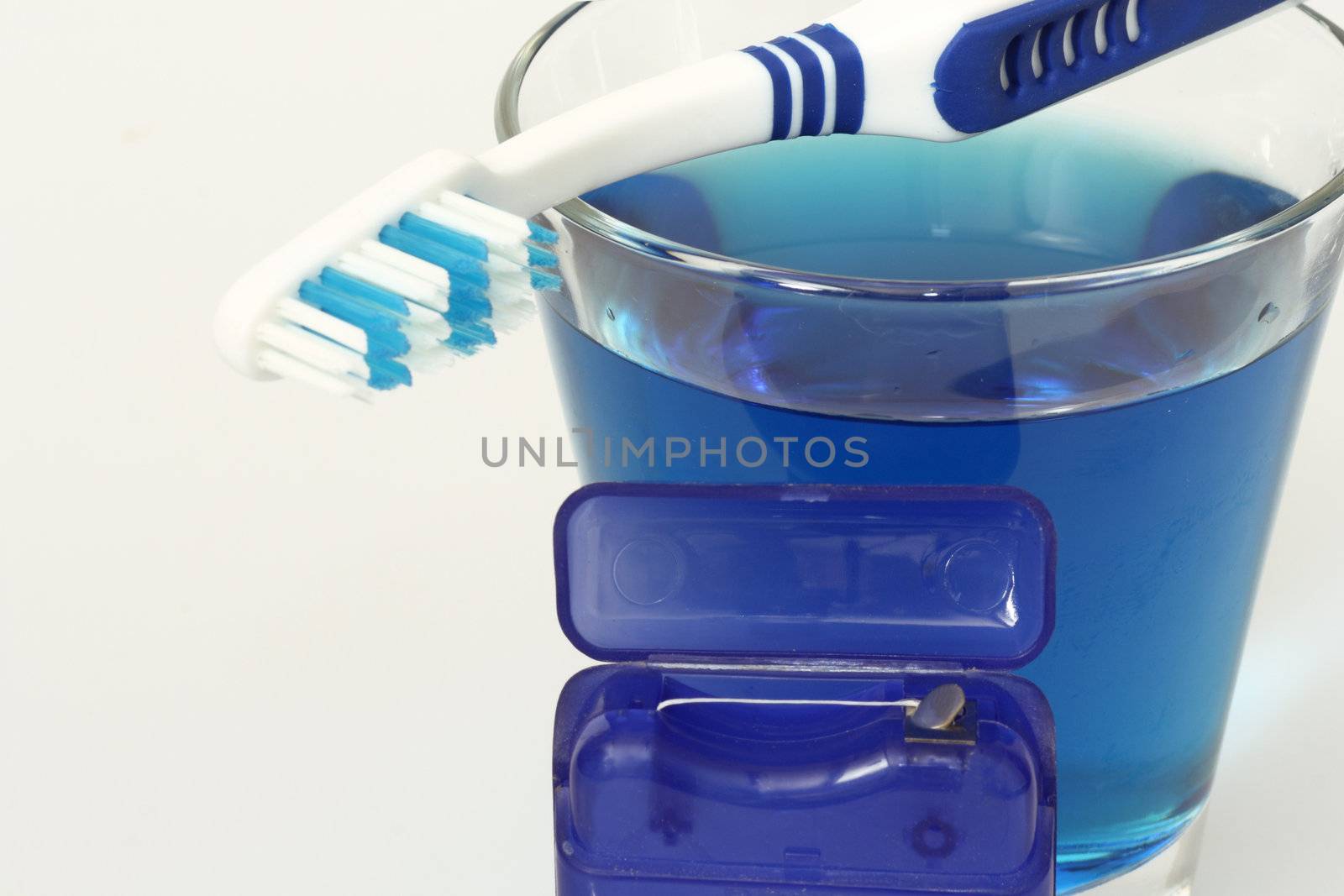 Dental care products on bright background
