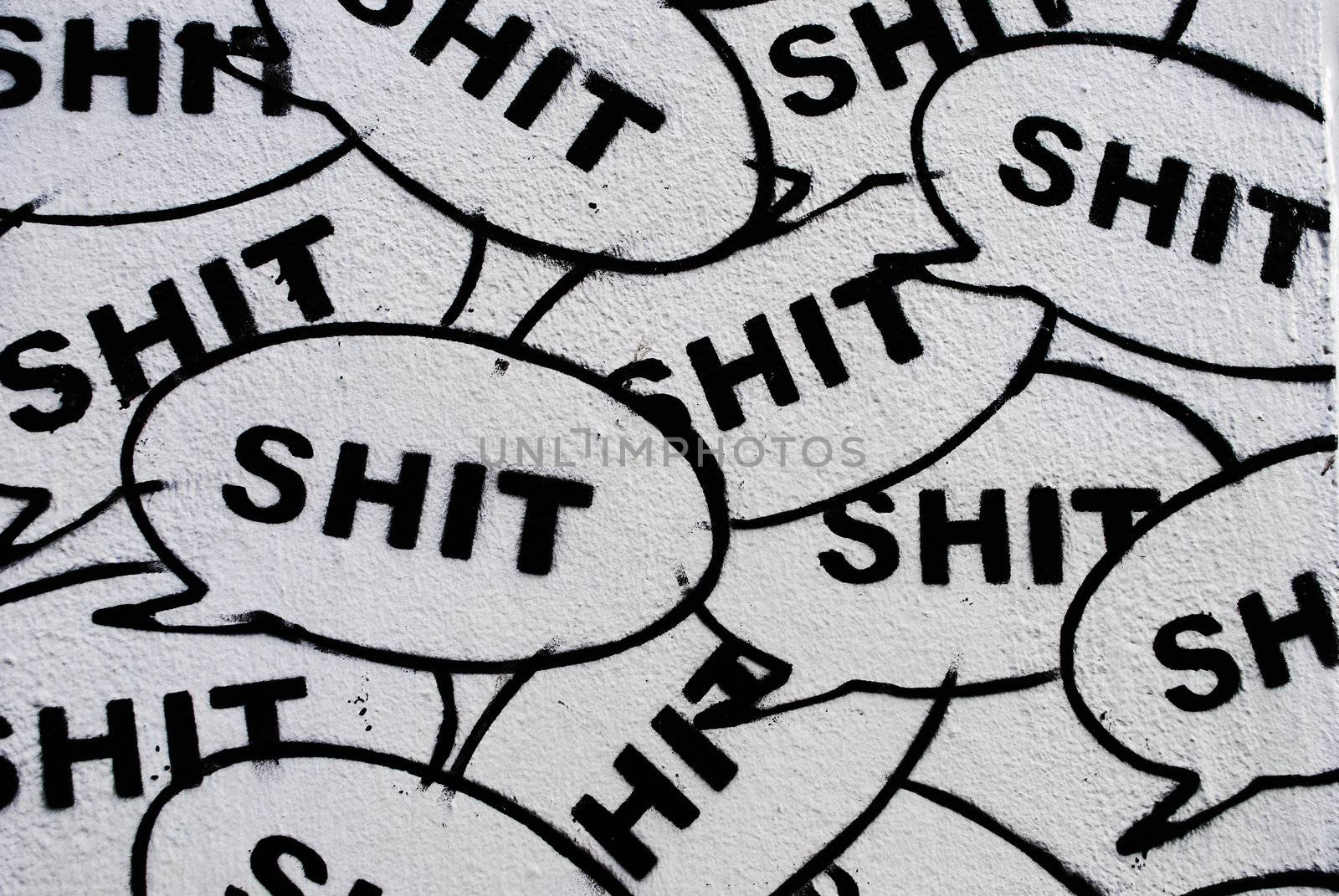 Stencils displaying the word 'Shit'.