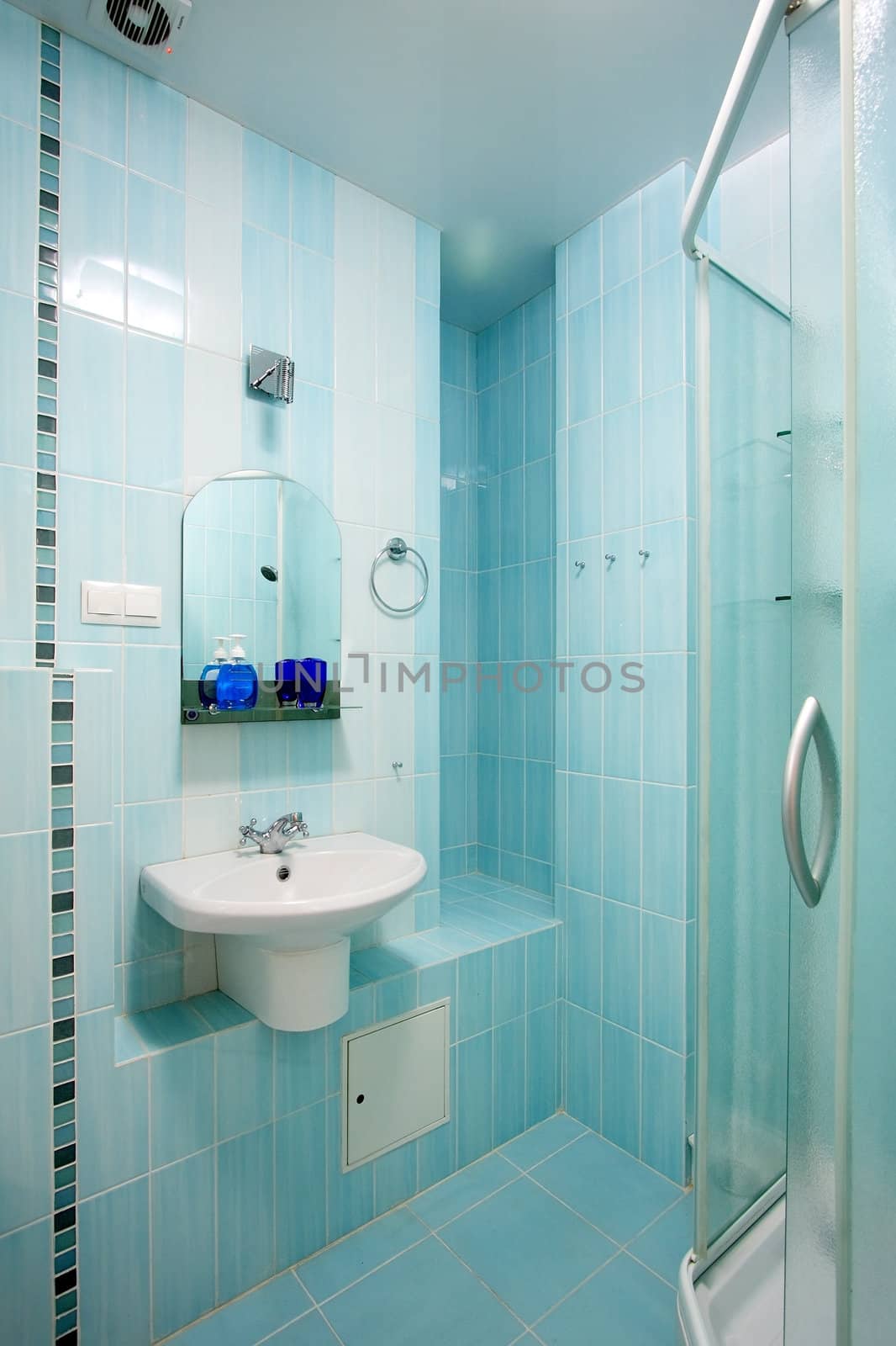 Beautiful modern bathroom with a shower and a bowl