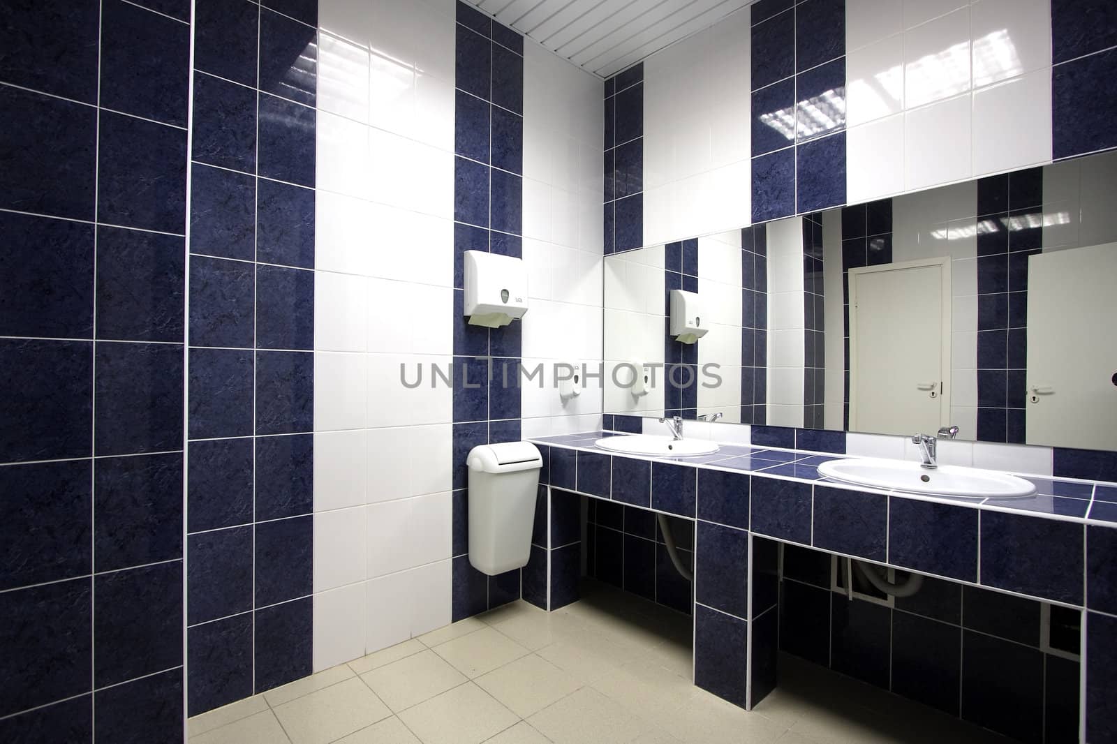 Beautiful modern toilet room with a bowl and a mirror