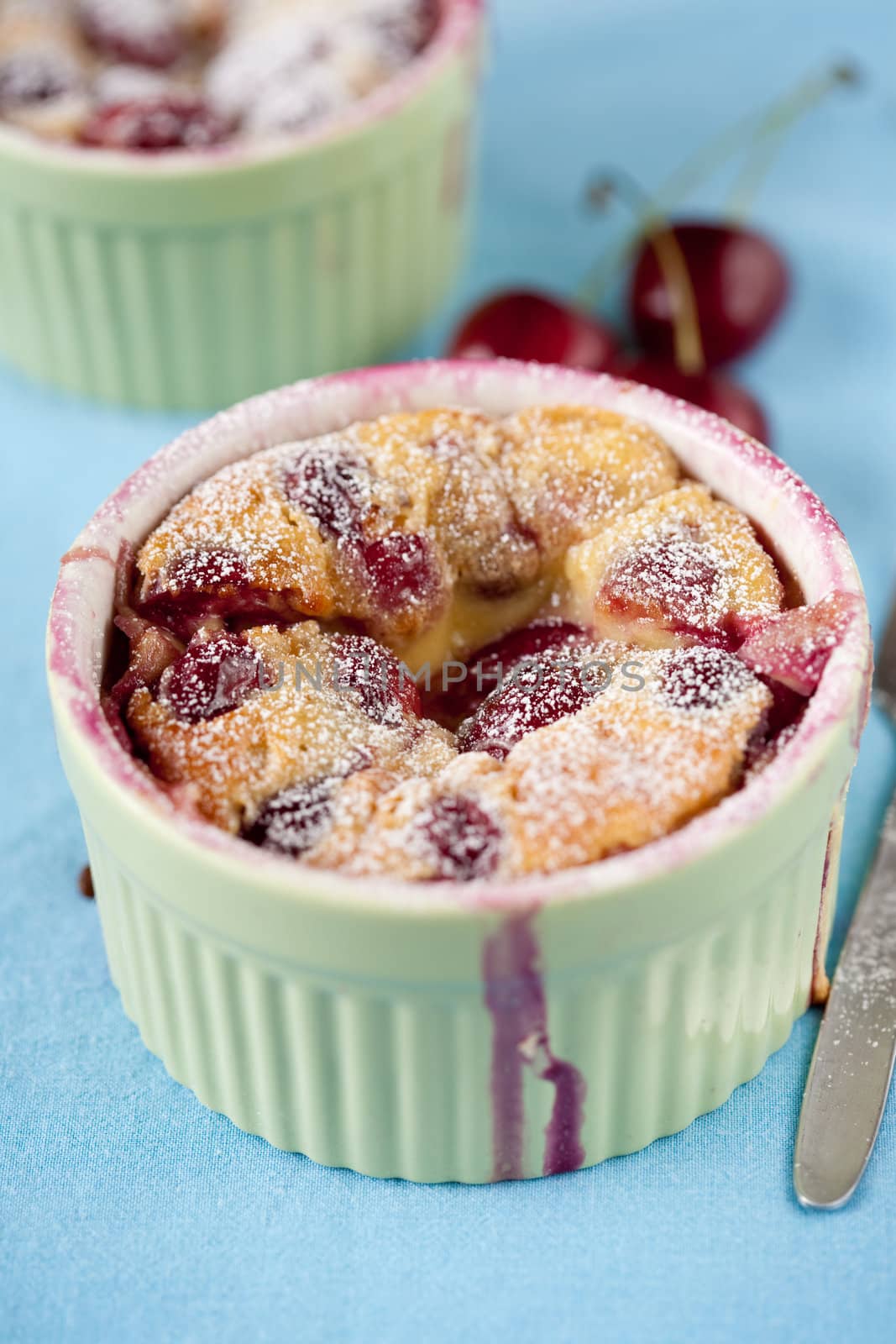 Delicious cherry clafoutis freshly baked in a ramekin