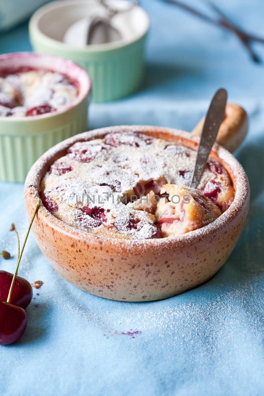 Delicious and freshly baked cherry clafoutis in baking form