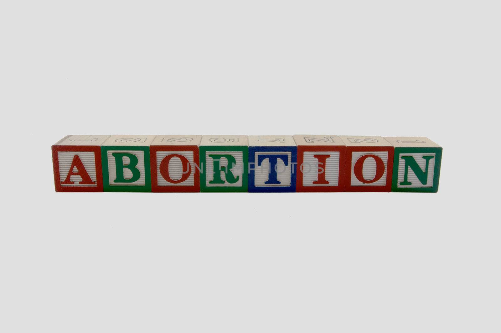 Wood Alphabet blocks spelling abortion