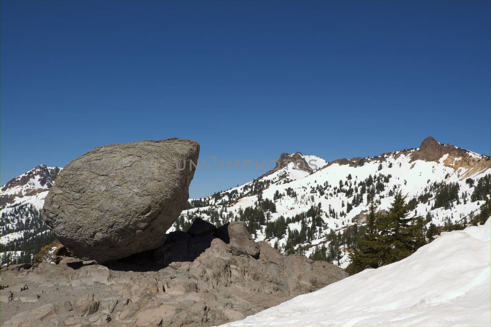 Boulder and Mountain Range by bobkeenan