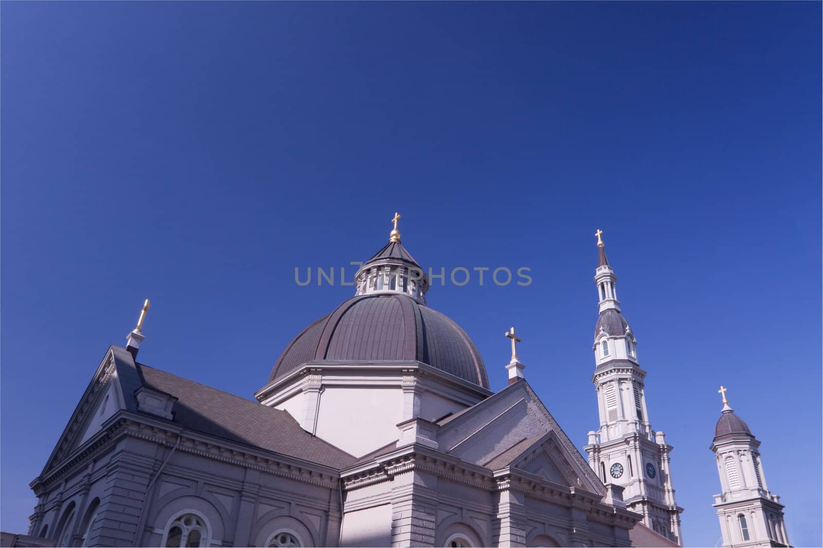 Five Cathedral Crosses on a California Cathedral against a deep blue sky