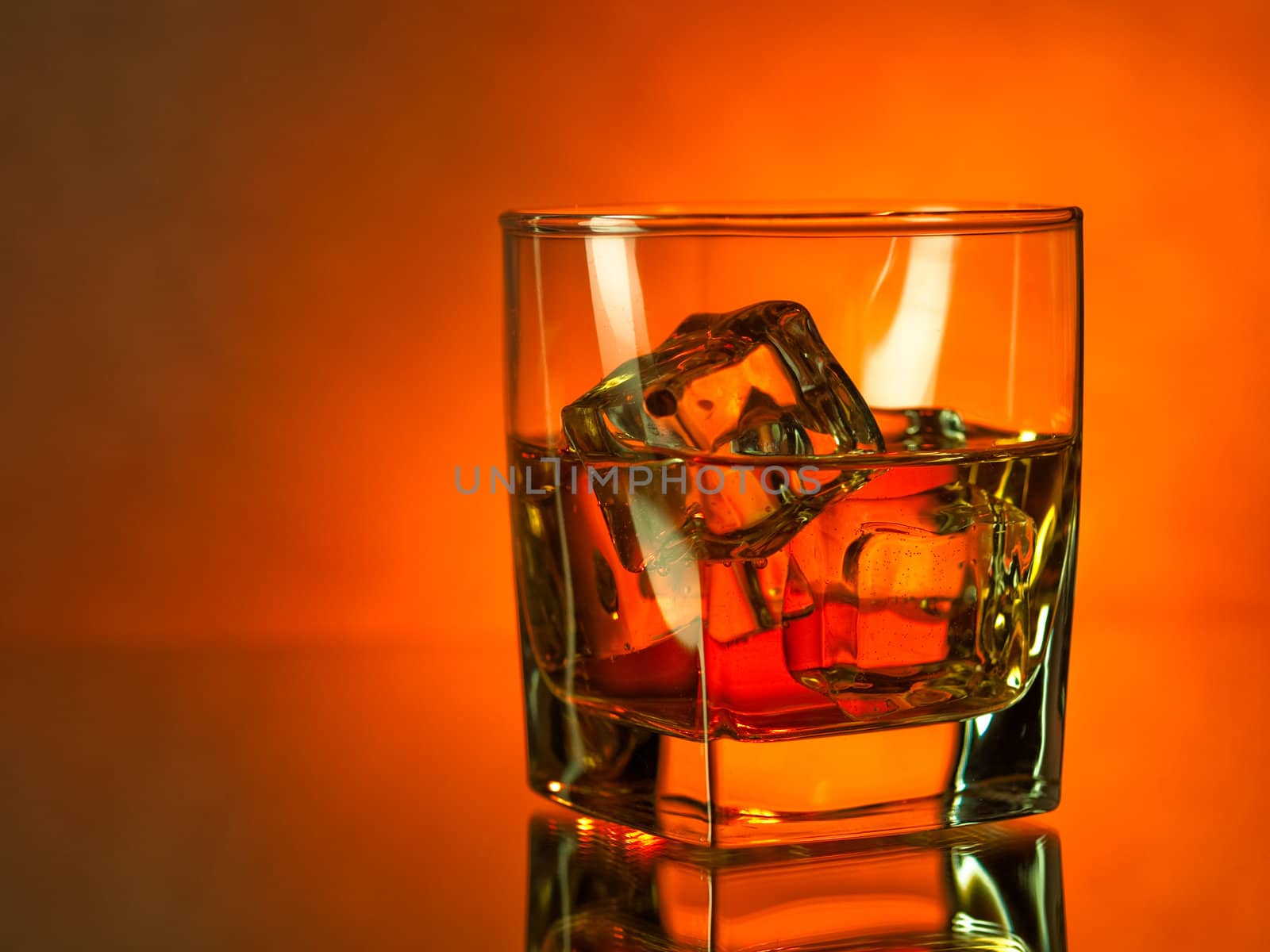 Whiskey on the rocks, vibrant colors