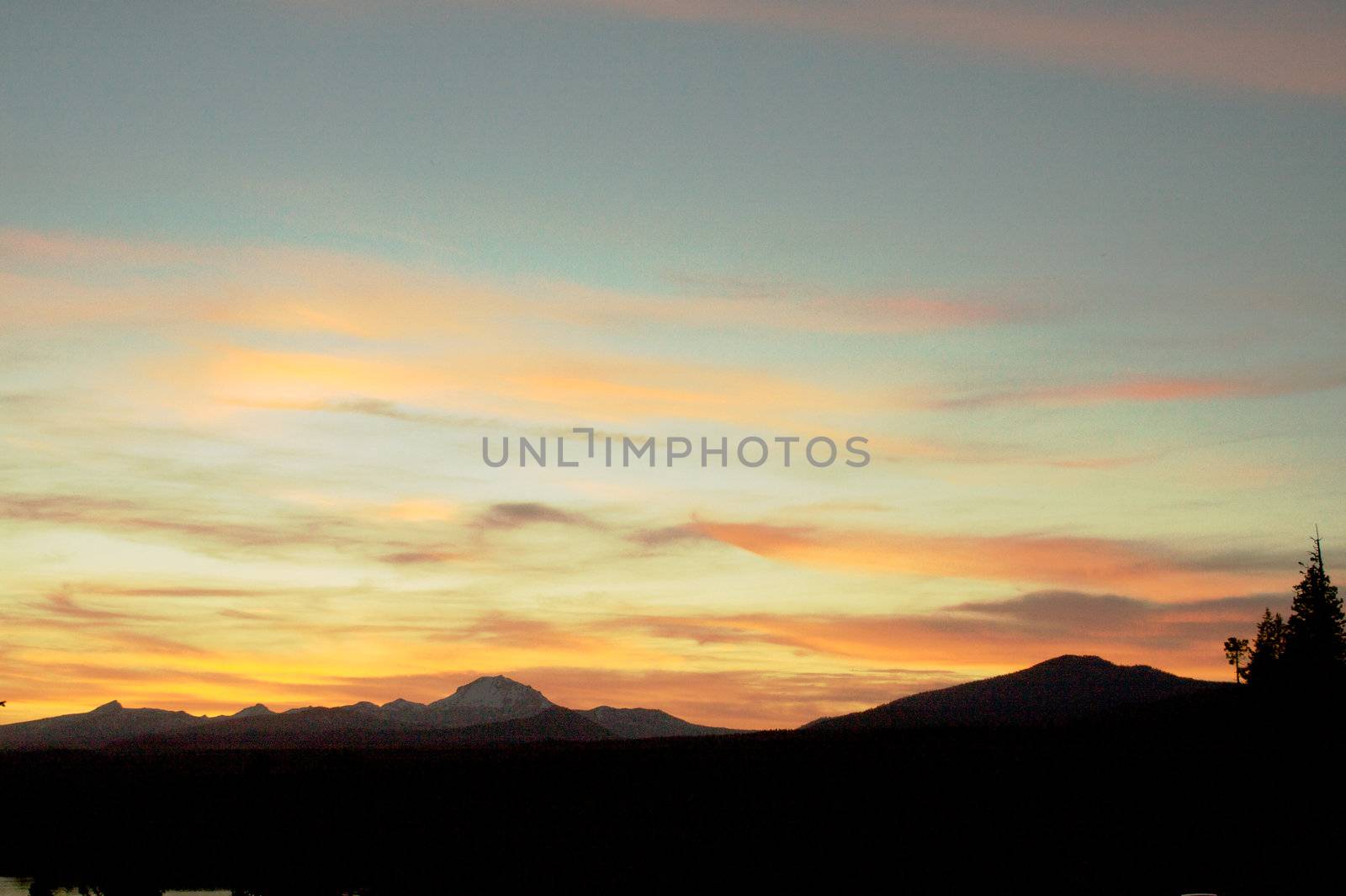 Sunset at Lassen Park with Mountain silhouetted against sky
