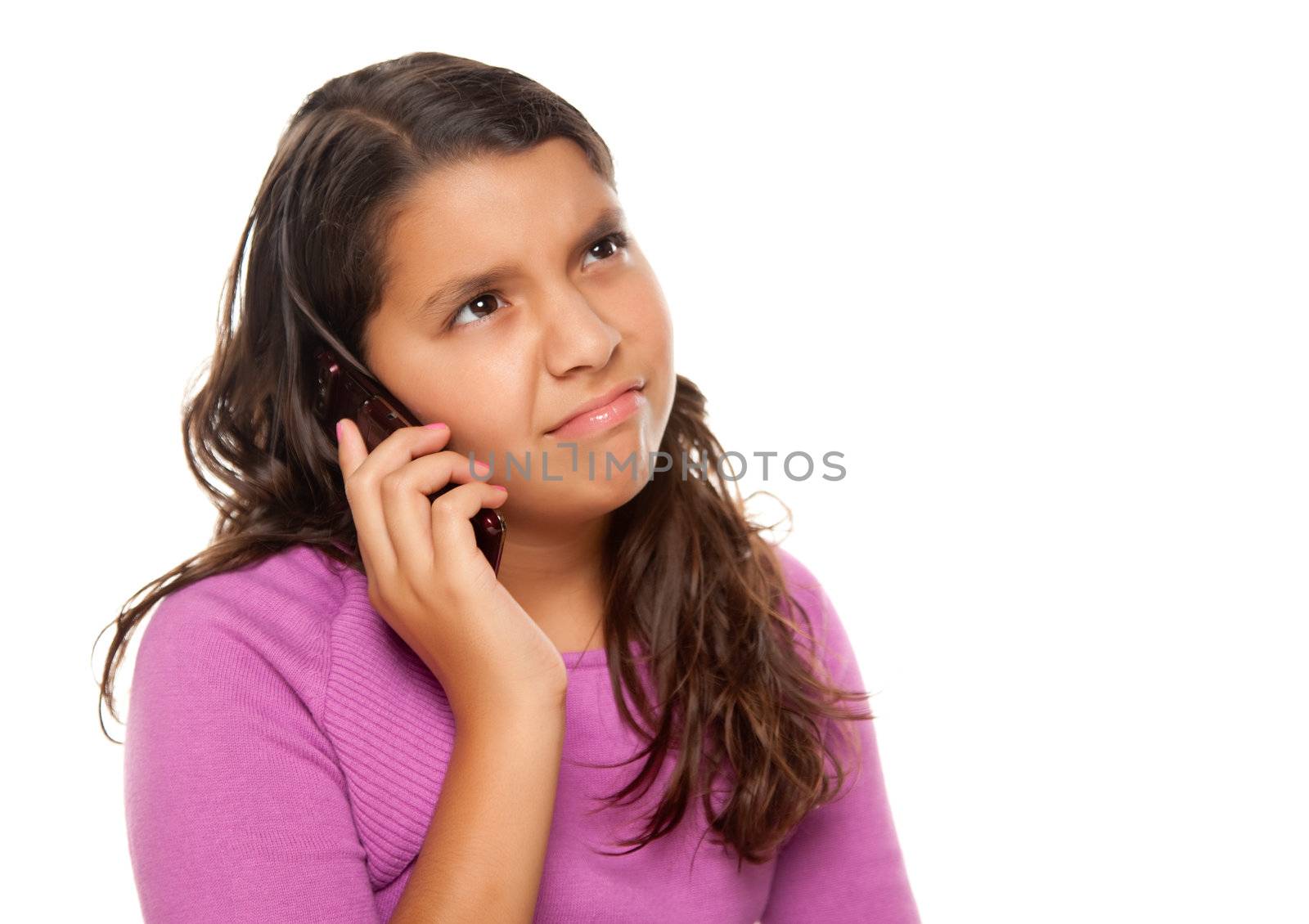 Frowning Hispanic Girl On Cell Phone by Feverpitched