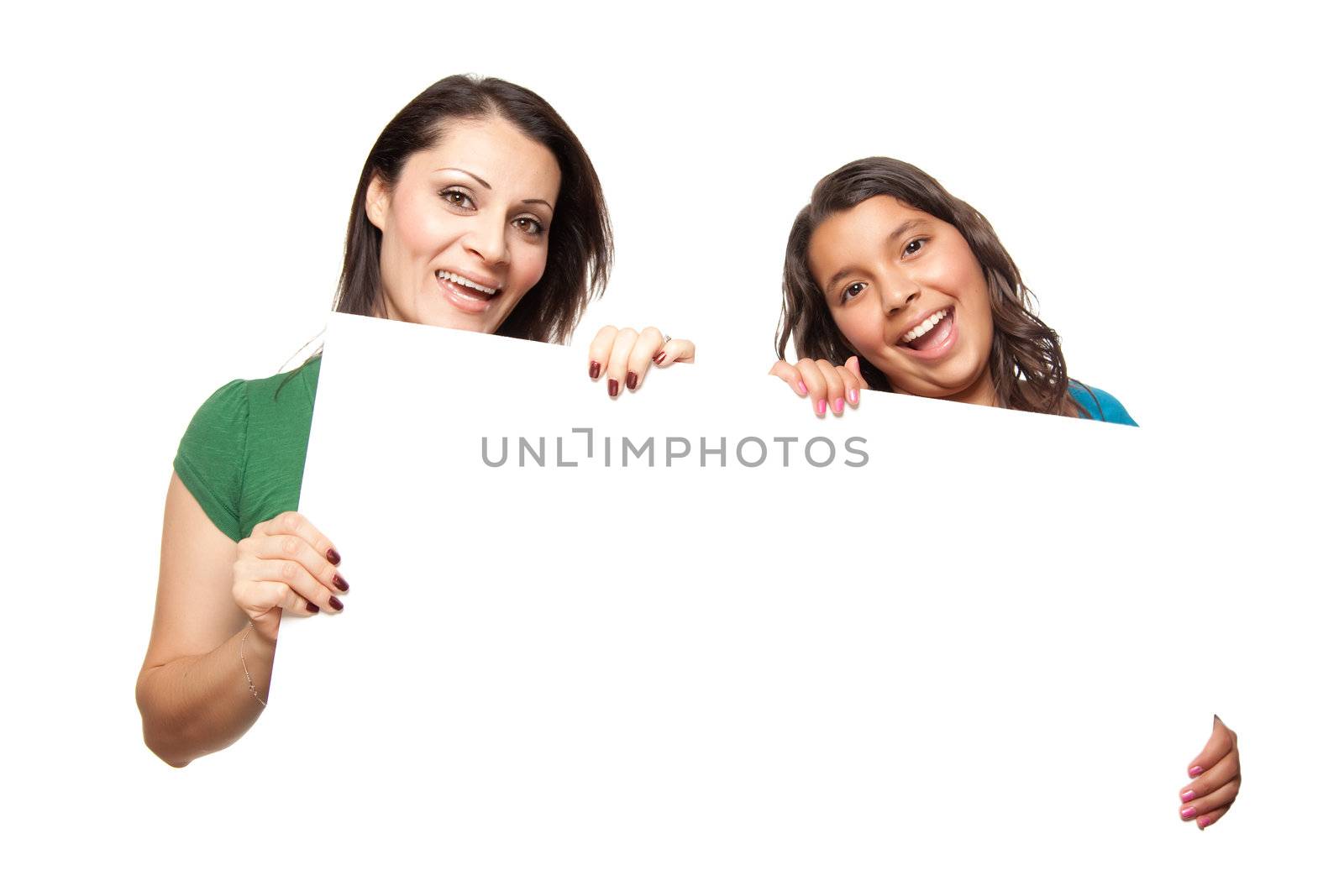 Pretty Hispanic Girl and Mother Holding Blank Board Isolated on a White Background.