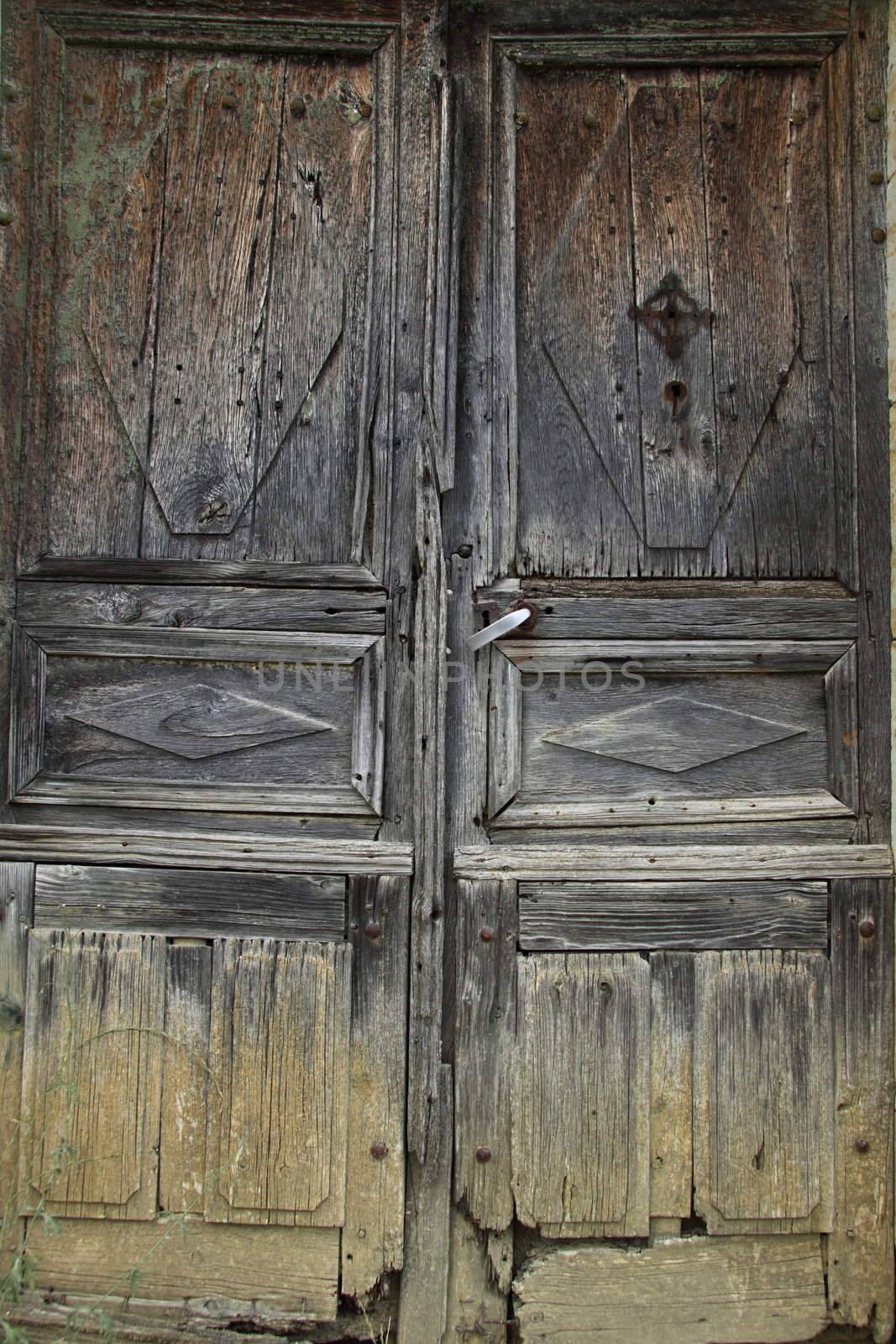 Doors to a derelict French farmhouse