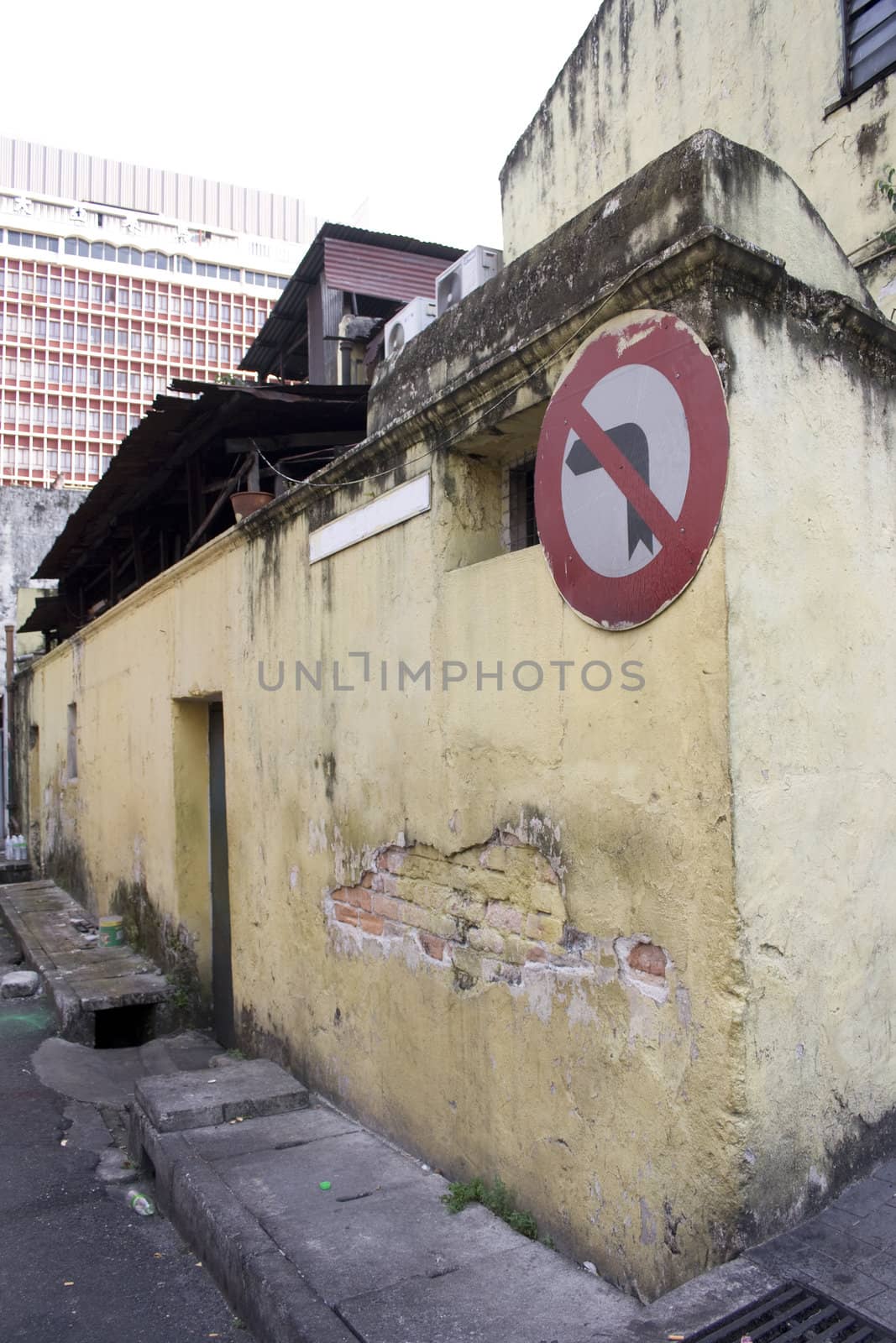 A back street with a no entry sign in Kuala Lumpur, Malaysia.