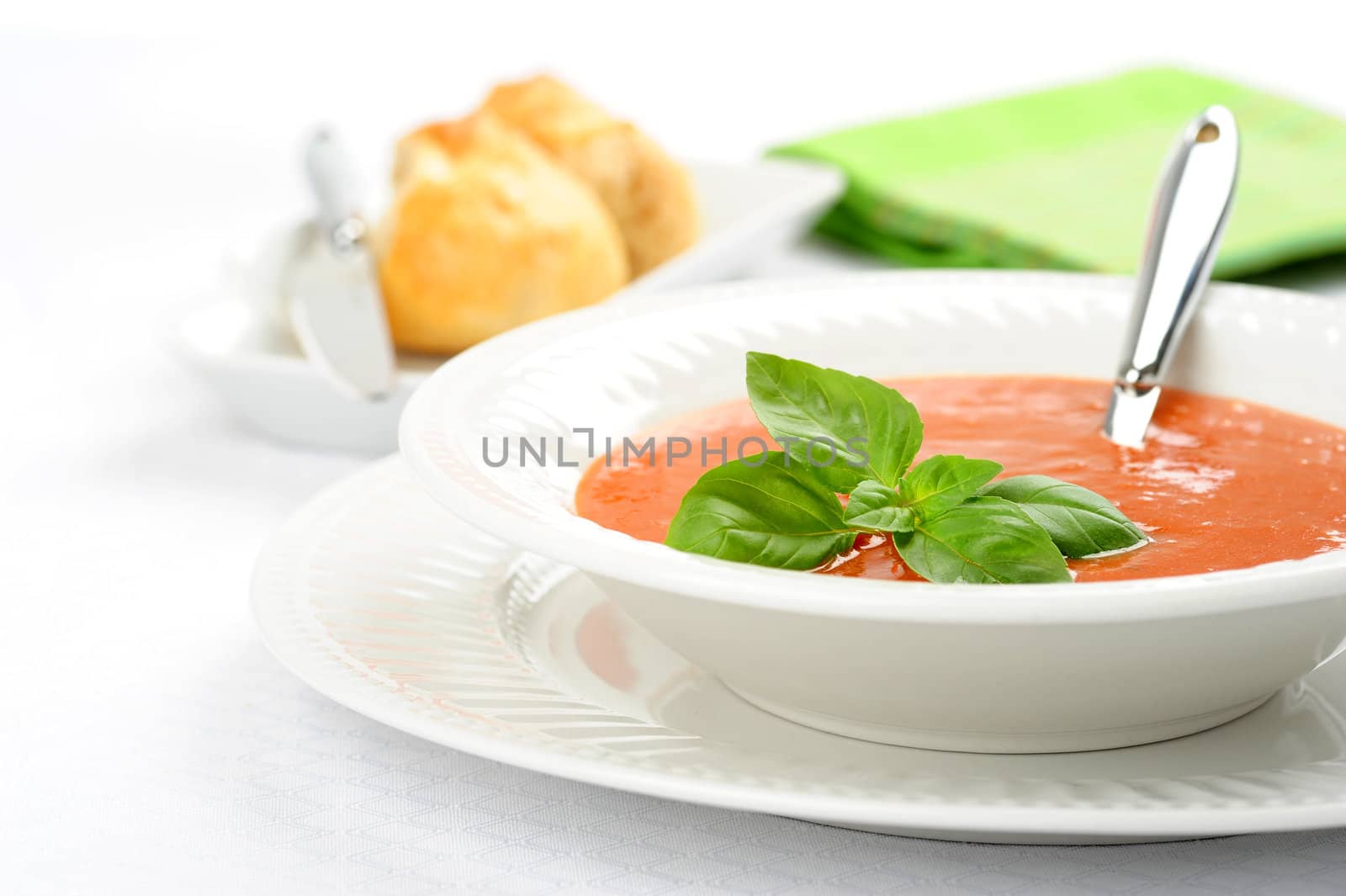 Bowl of homemade hot basil and tomato soup.