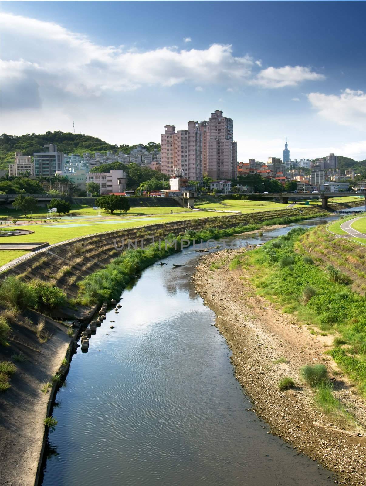 Here is a cityscape of apartment with beautiful river.