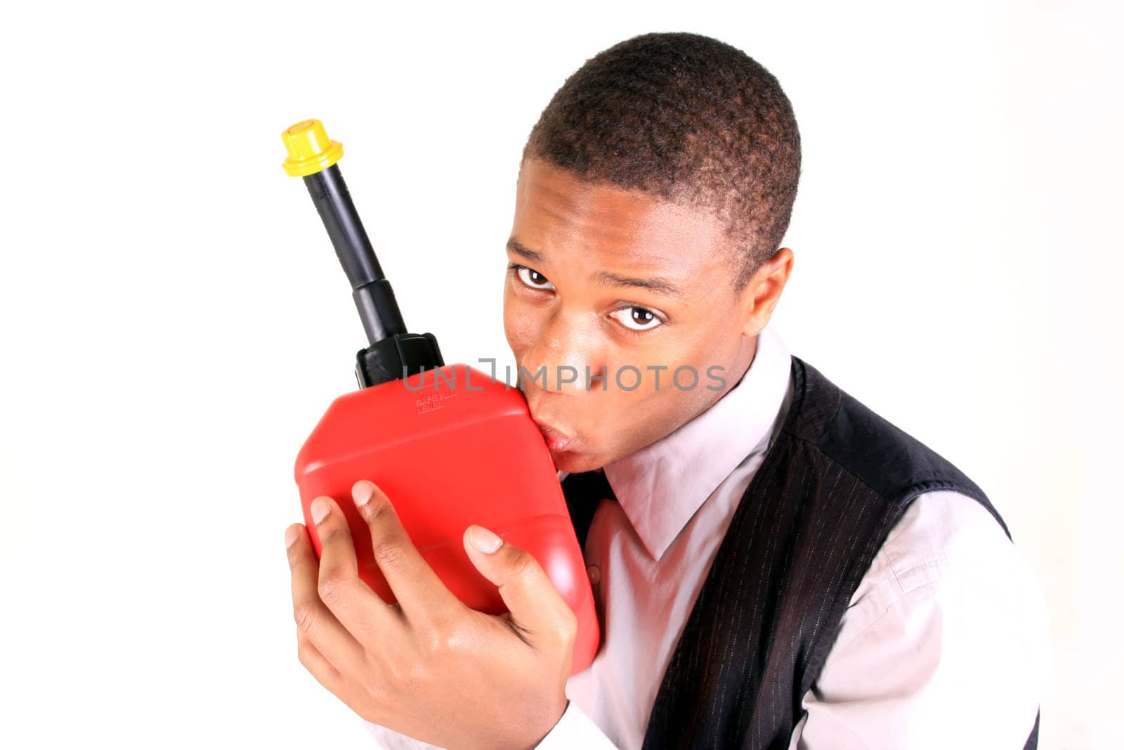 A young man holding a gas can