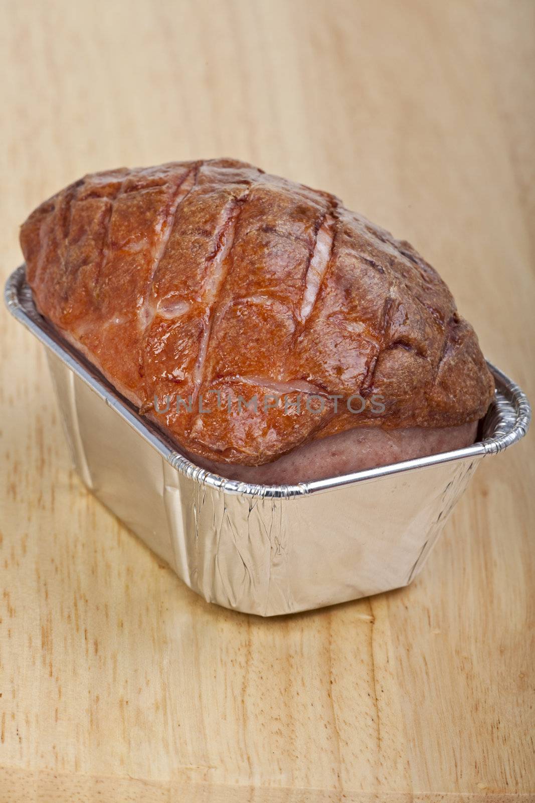 baked bavarian meat loaf on a wooden desk