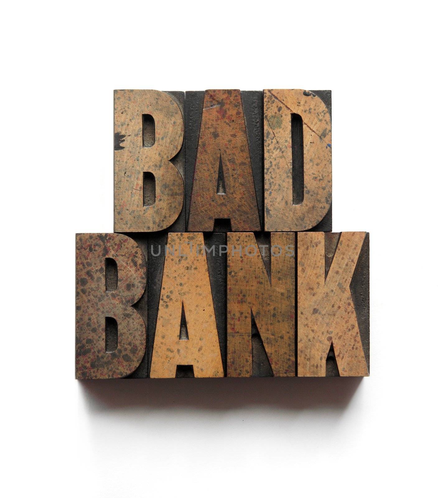 the words 'bad bank' in old ink-stained wood type
