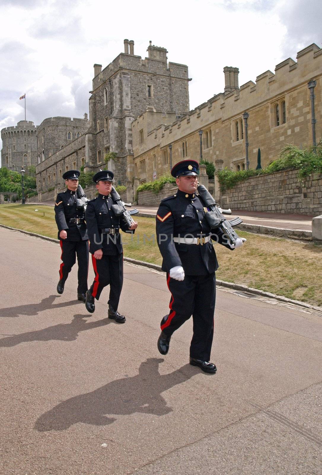 Marching Foot Guards at the changing of guards at Windsor Castle, the largest inhabited castle in the world. The Foot Guards are the infantry regiments of the British Army.