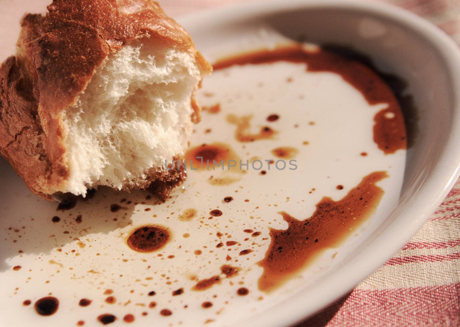 crusty bread dipped in olive oil and balsamic vinegar on an outdoor table