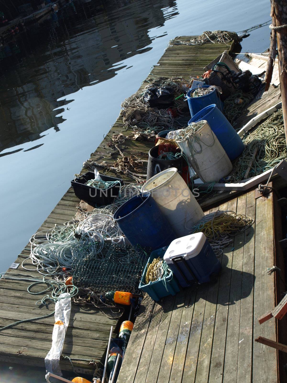 A working lobster boat dock along the dock in Portland, Maine during the summer