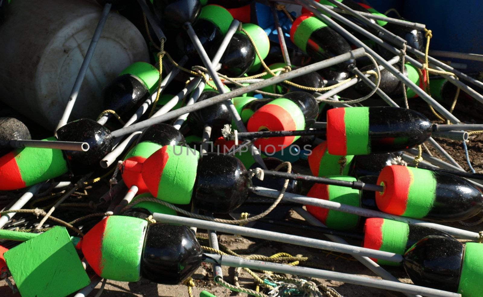 lobster trap markers along the dock in Portland, Maine during the summer