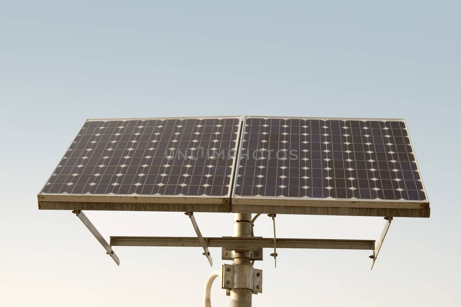 Closeup of a solar panel, blue sky