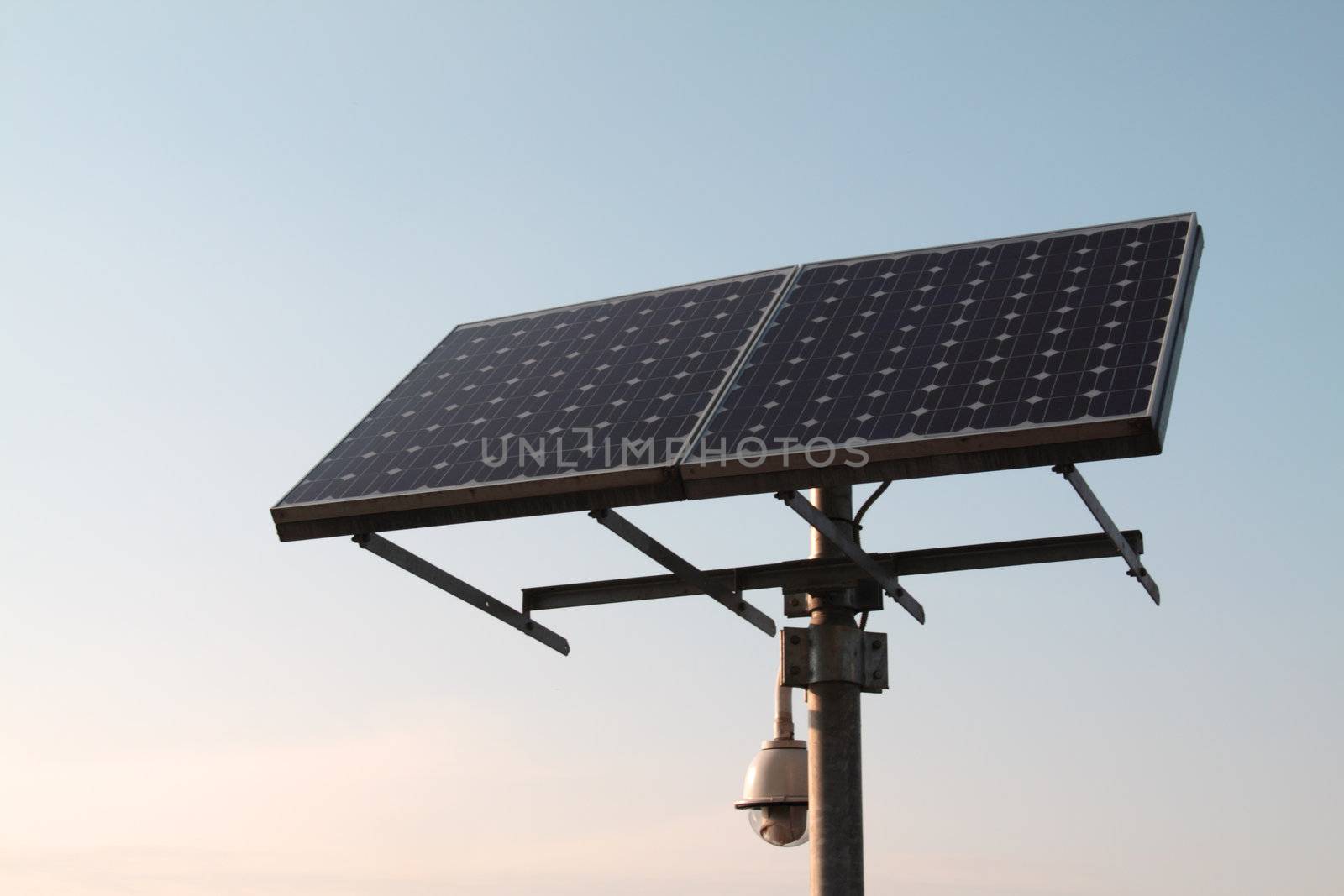 Closeup of a solar panel, blue sky